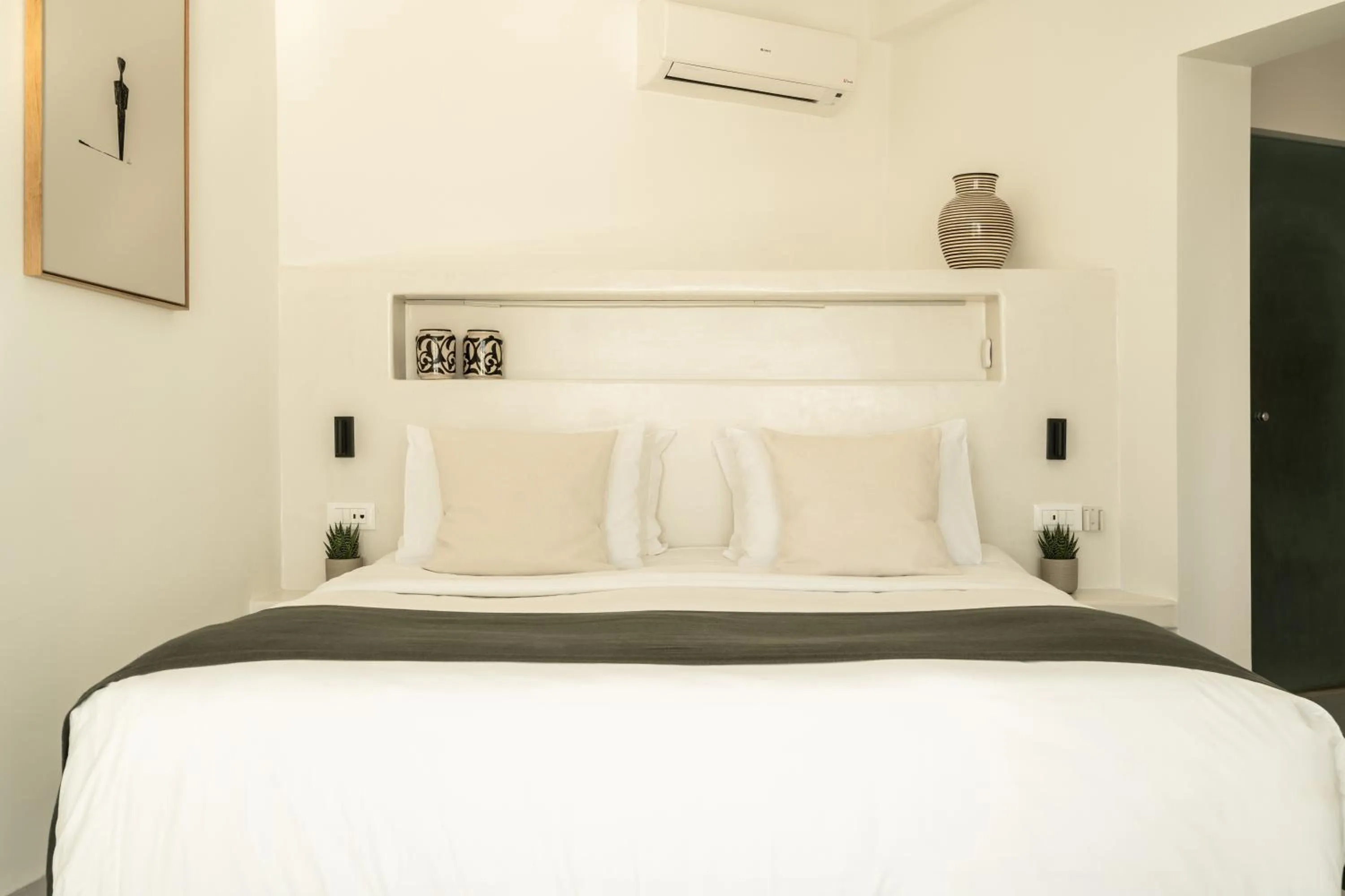 Bed in Rocabella Santorini Hotel & Spa