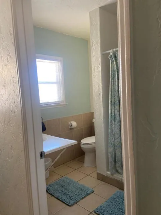 Bathroom, Bed in The Patriots Boutique Motel