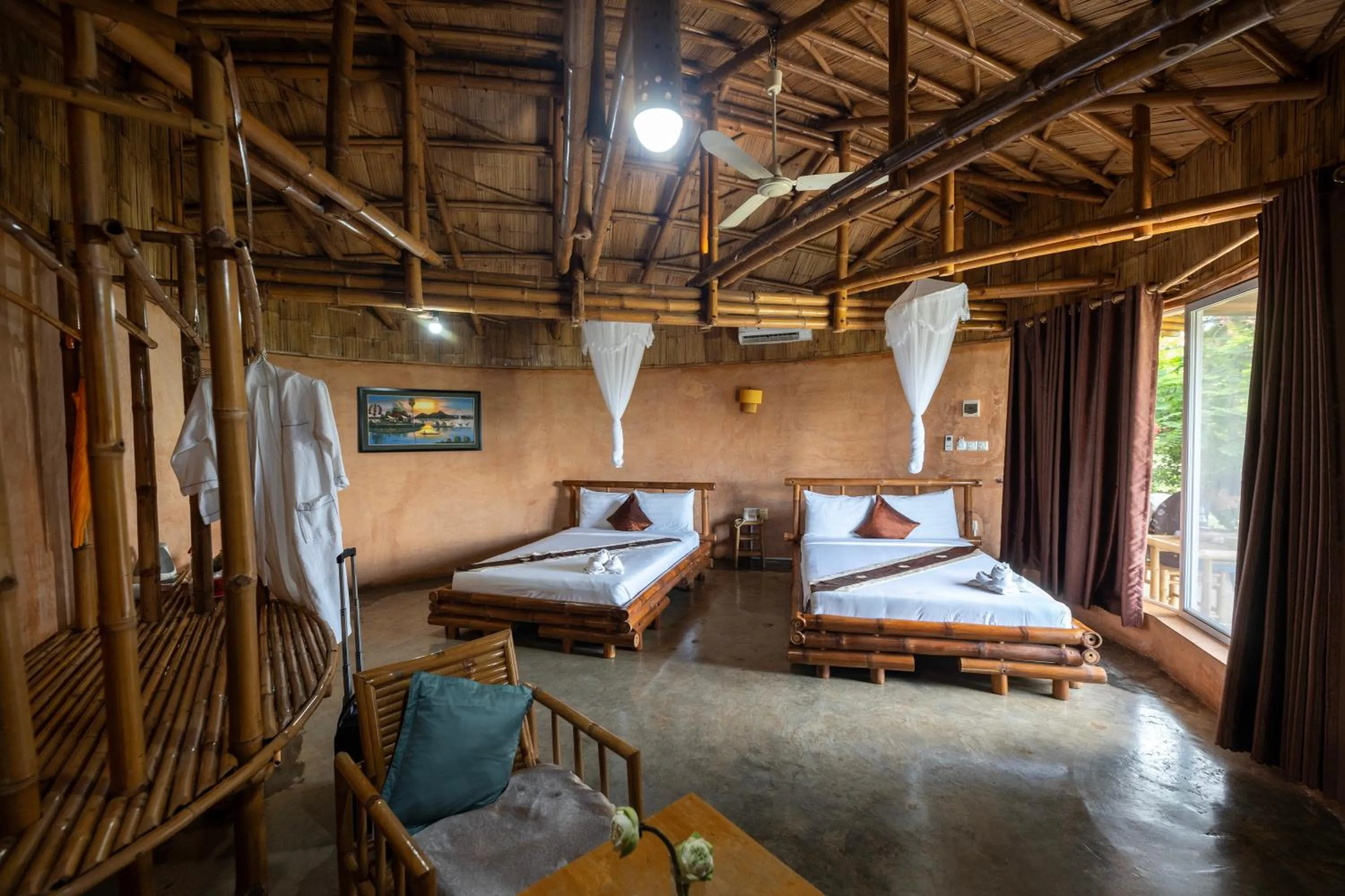 Bed in Hanchey Bamboo Resort