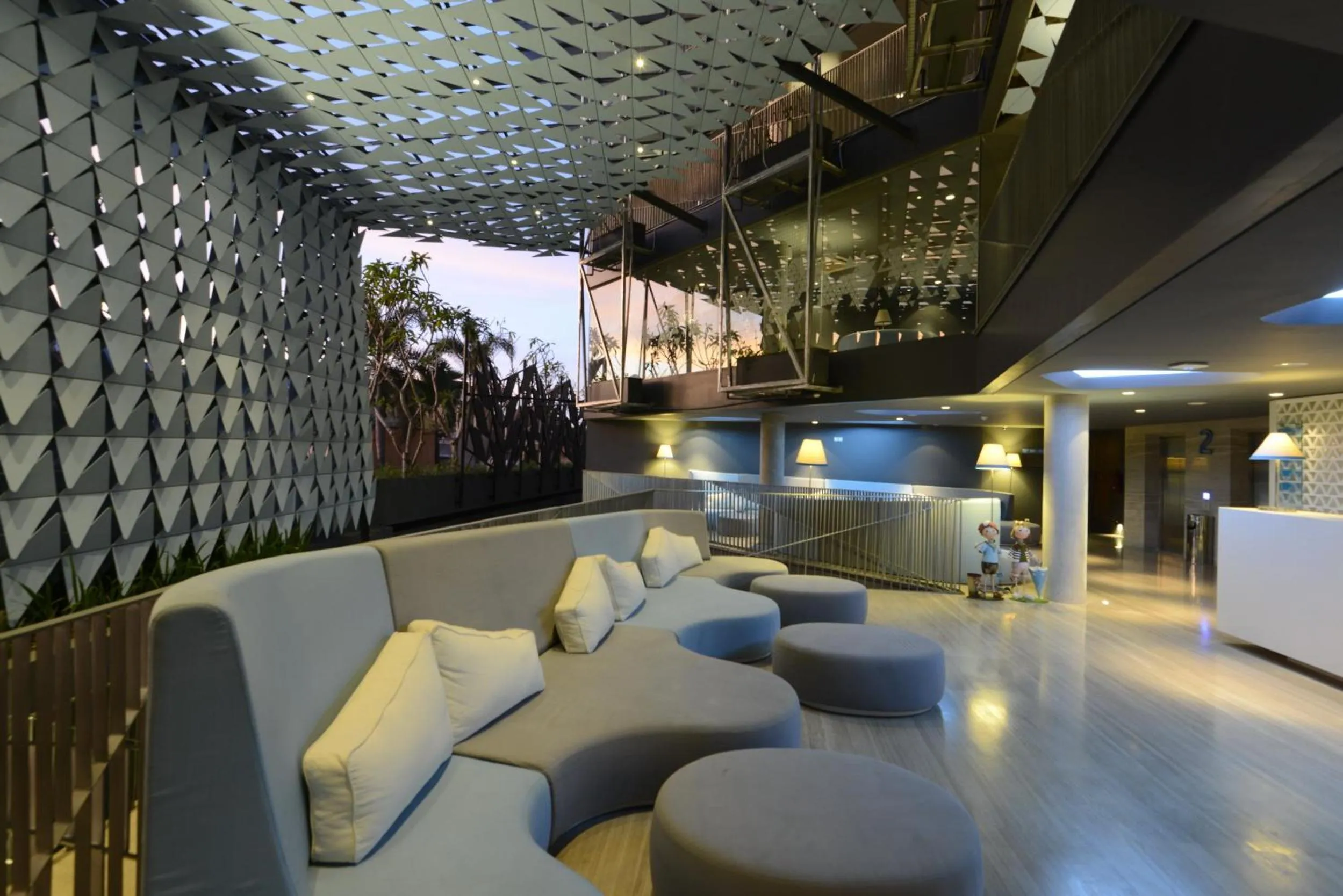 Communal lounge/ TV room in IZE Seminyak by LifestyleRetreats