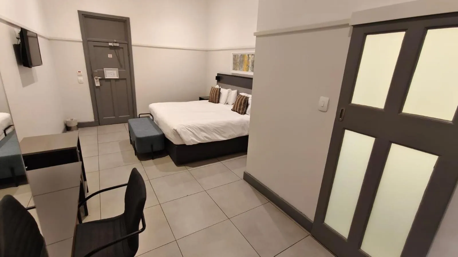 Bed in THE Pretoria Hotel