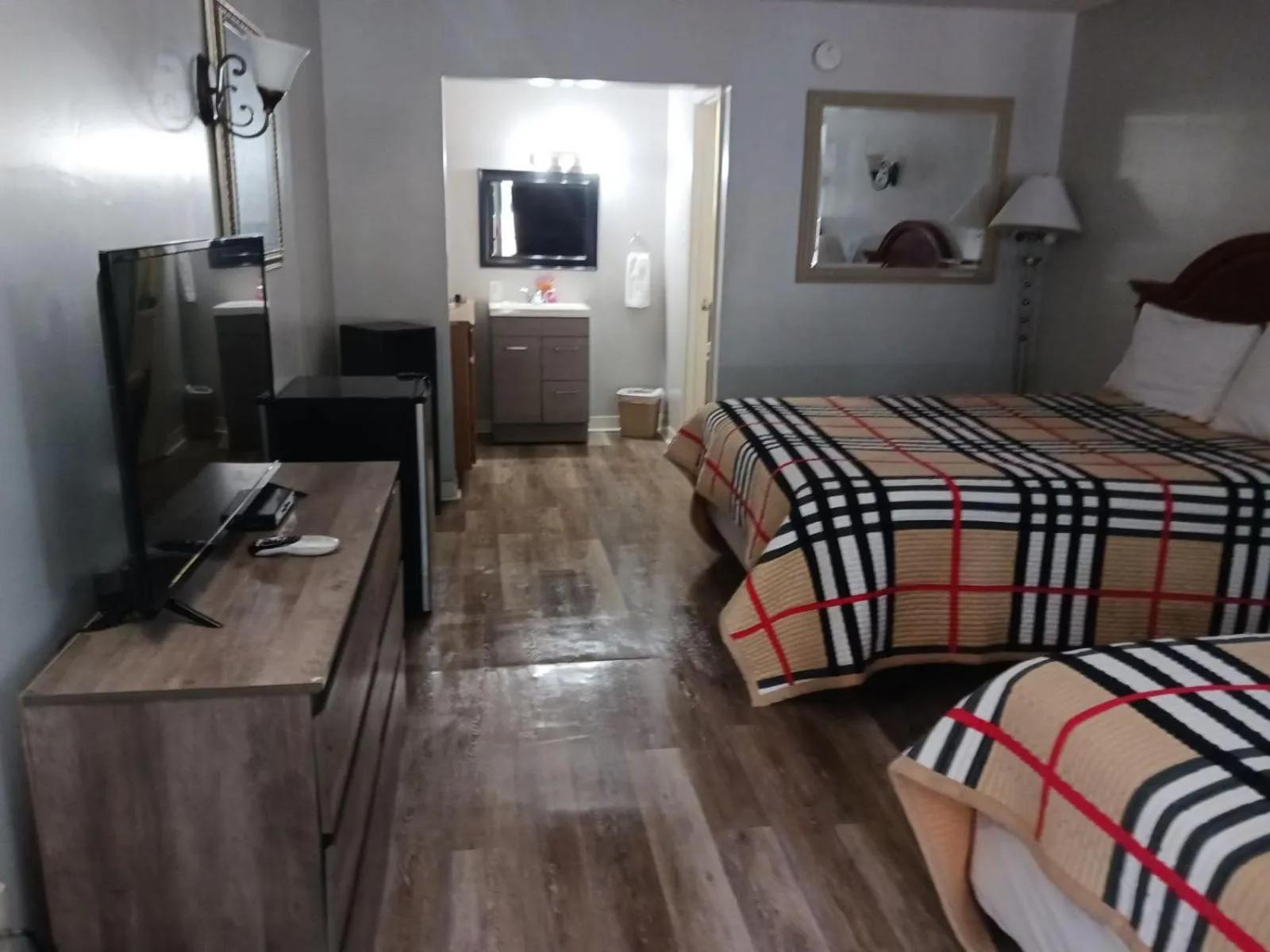 Bed in ANS INN & SUITES