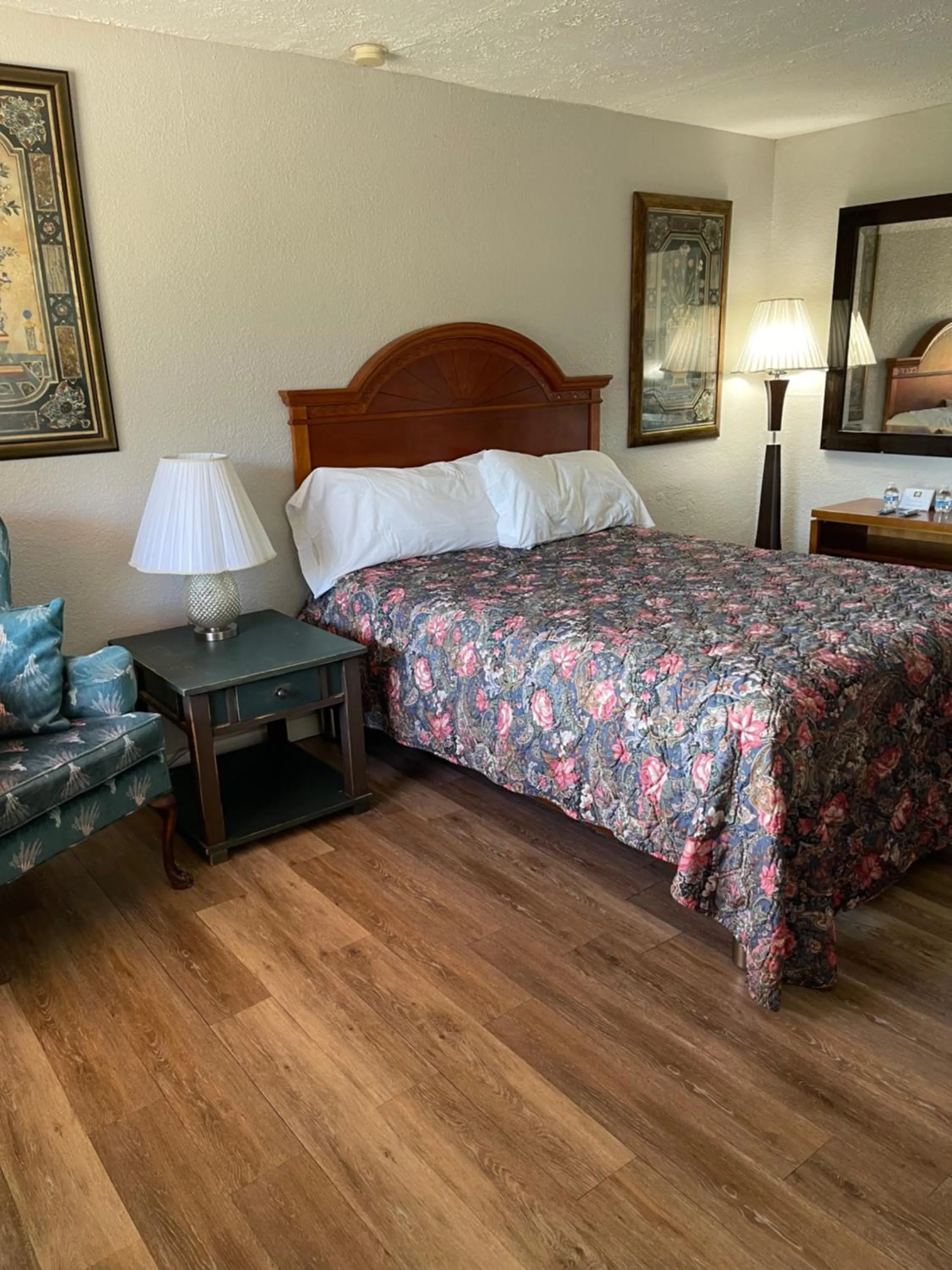 Bed in ANS INN & SUITES