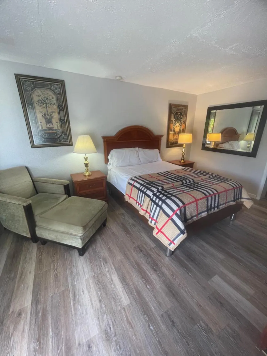 Bed in ANS INN & SUITES