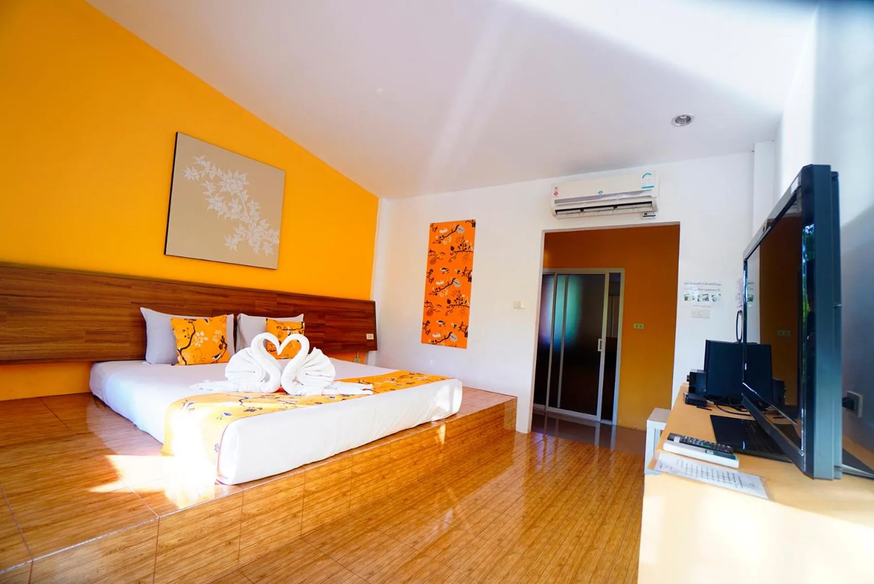 Photo of the whole room, Bed in Aurora Resort Kanchanaburi