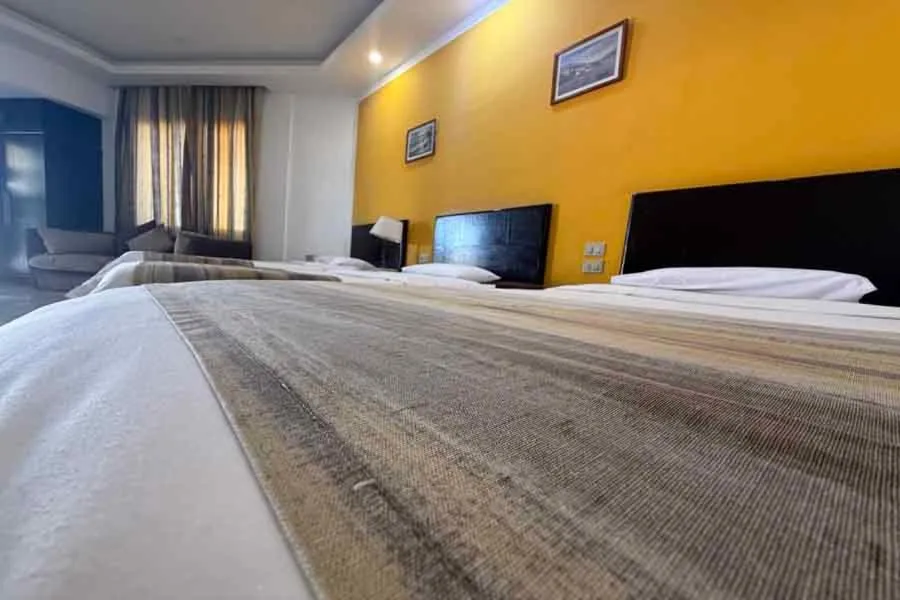 Bed in Naama Inn Hotel