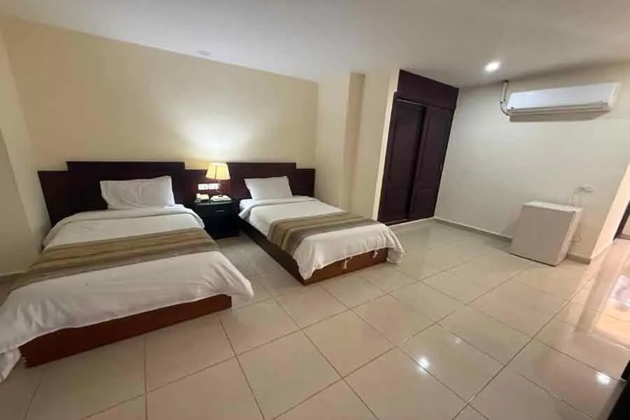 Bed in Naama Inn Hotel