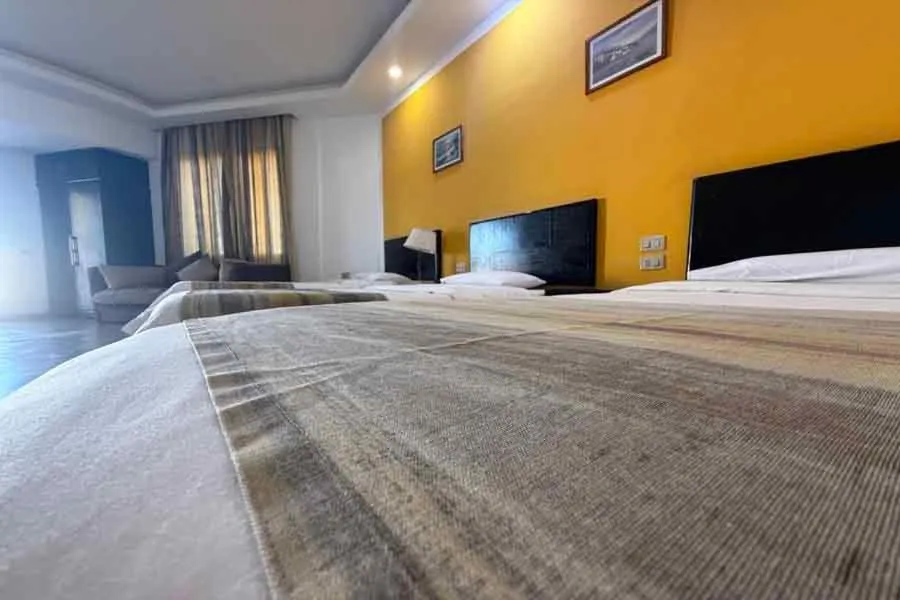 Bed in Naama Inn Hotel