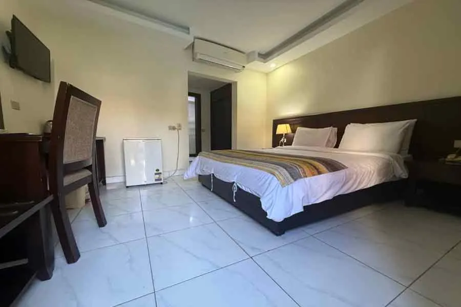 Bed in Naama Inn Hotel