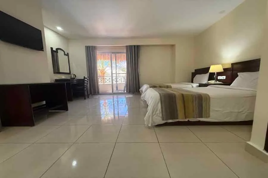 Bed in Naama Inn Hotel