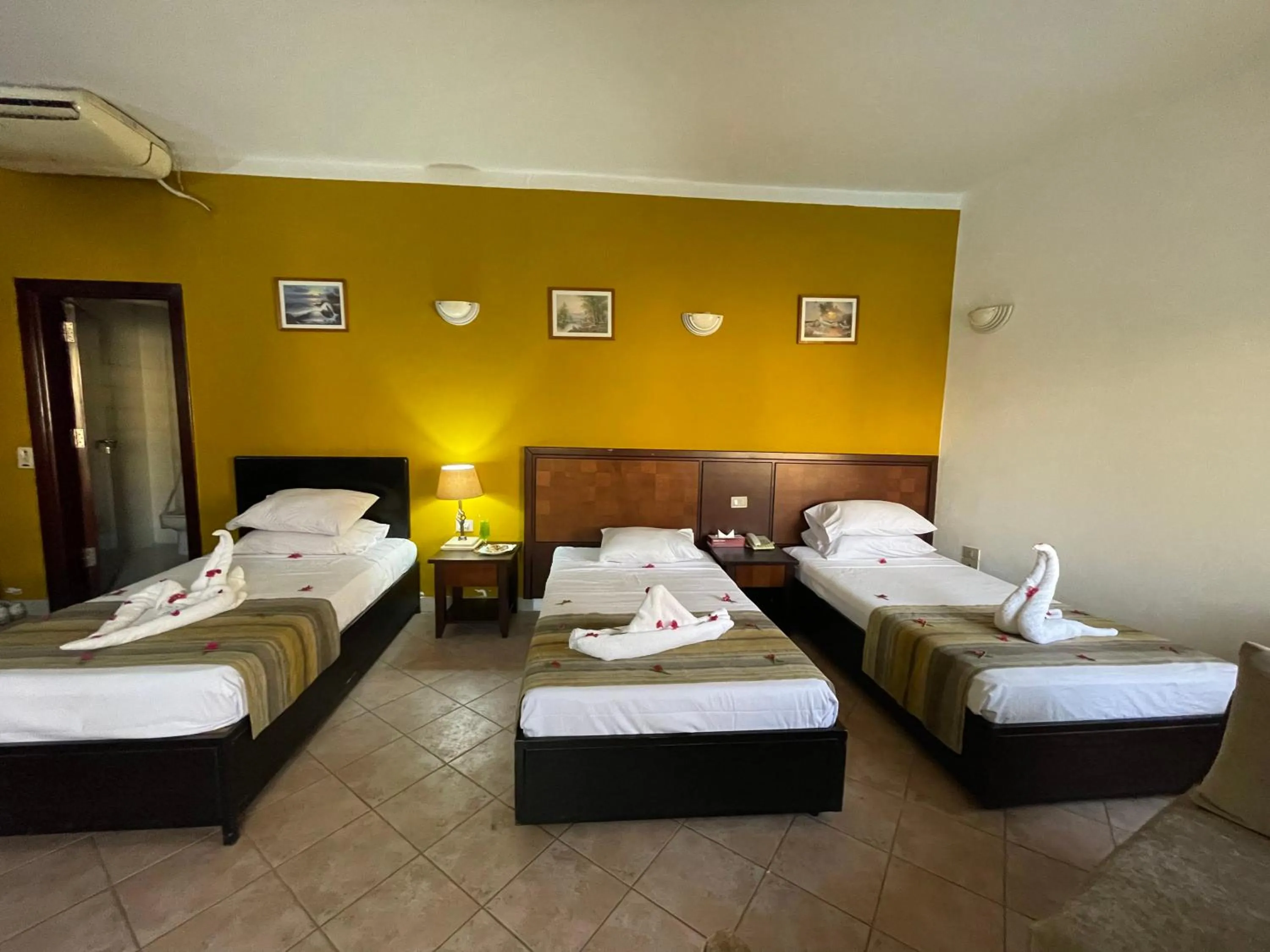 Bed in Naama Inn Hotel