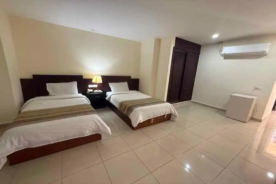 Bed in Naama Inn Hotel