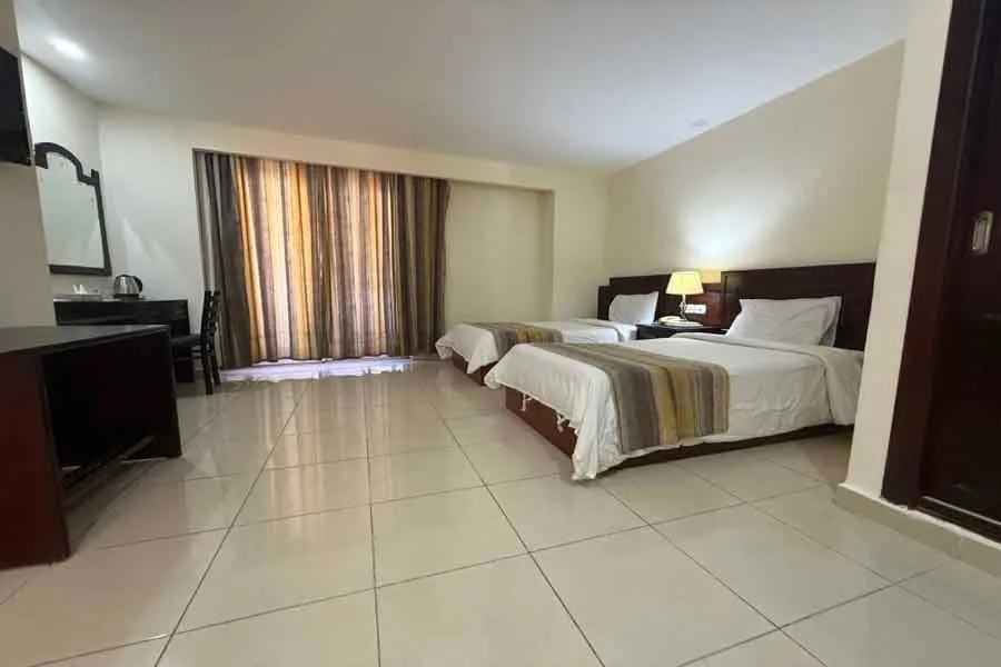 Bed in Naama Inn Hotel