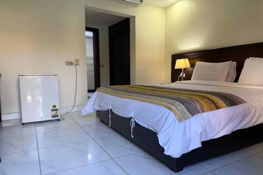 Bed in Naama Inn Hotel