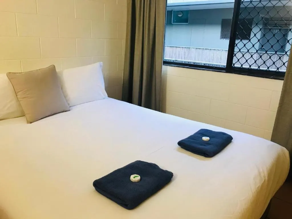Bed in Koala Beach Resort Cairns
