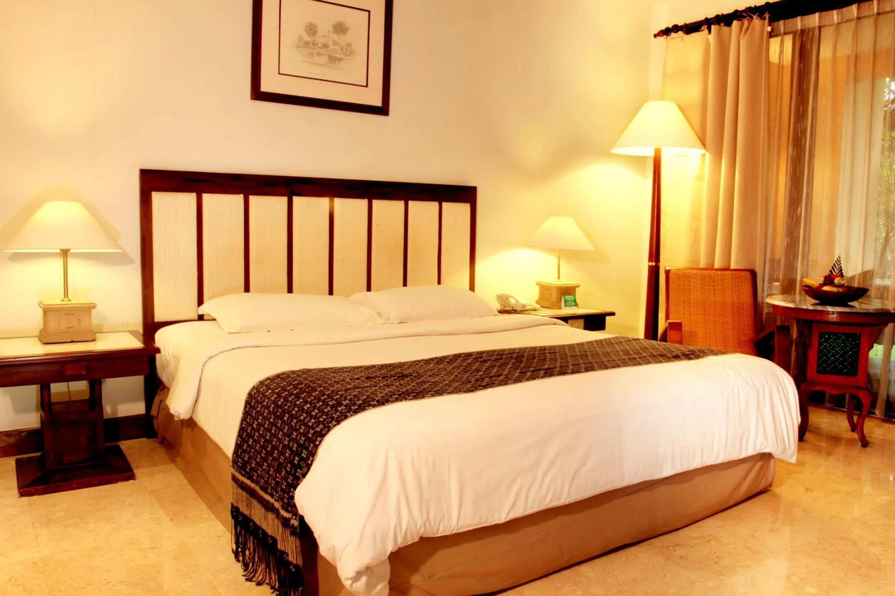 Bed in Laras Asri Resort & Spa