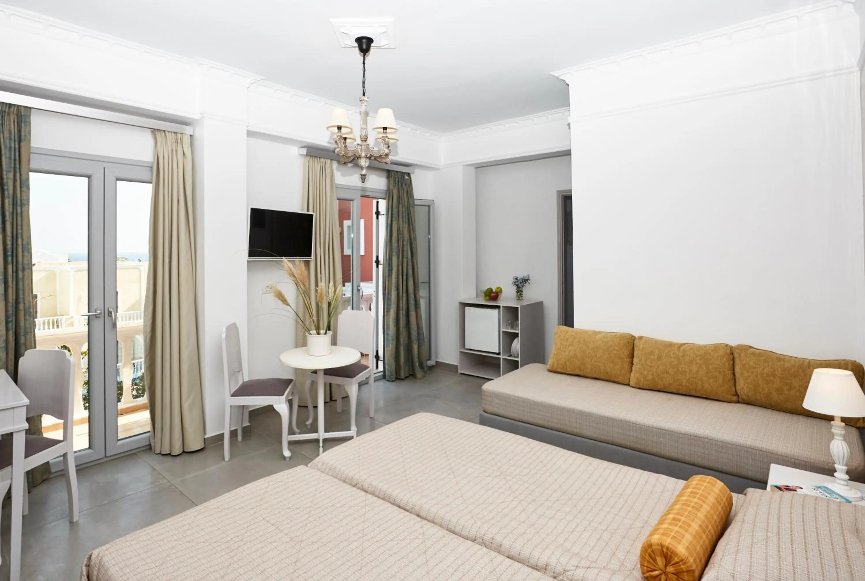 Photo of the whole room, Bed in Blue Sea Hotel