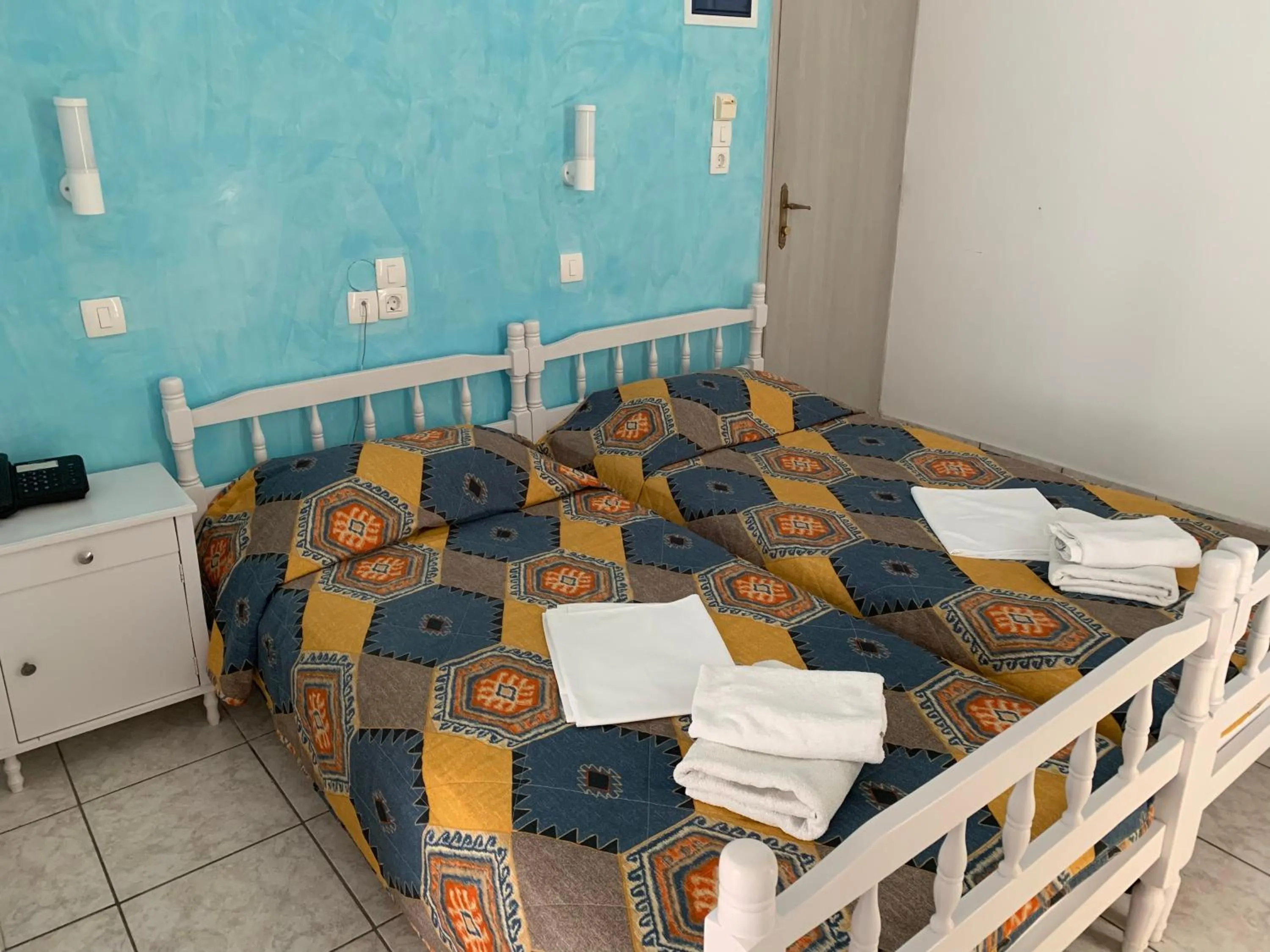 Bed in Blue Sea Hotel