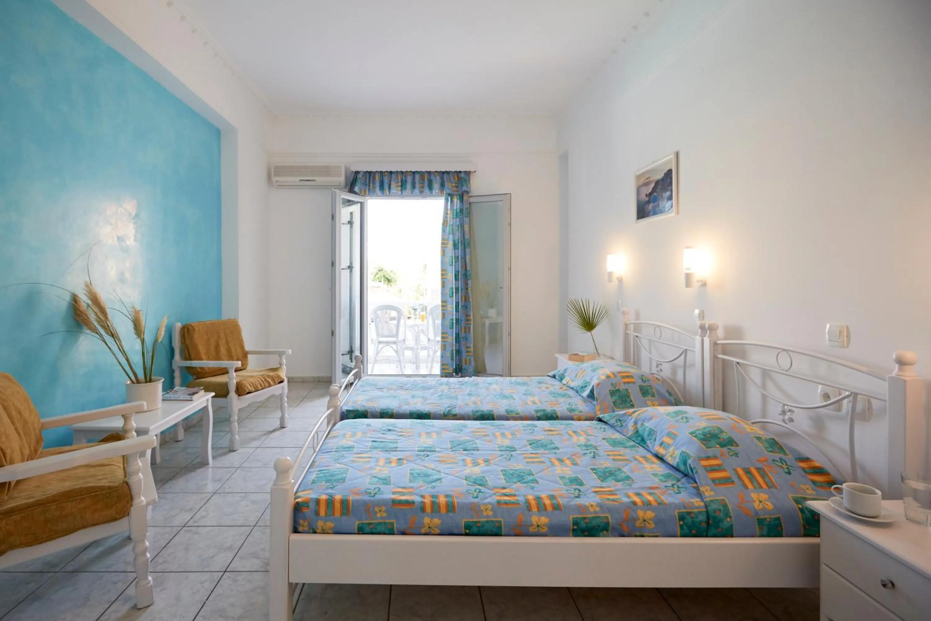 Photo of the whole room, Bed in Blue Sea Hotel