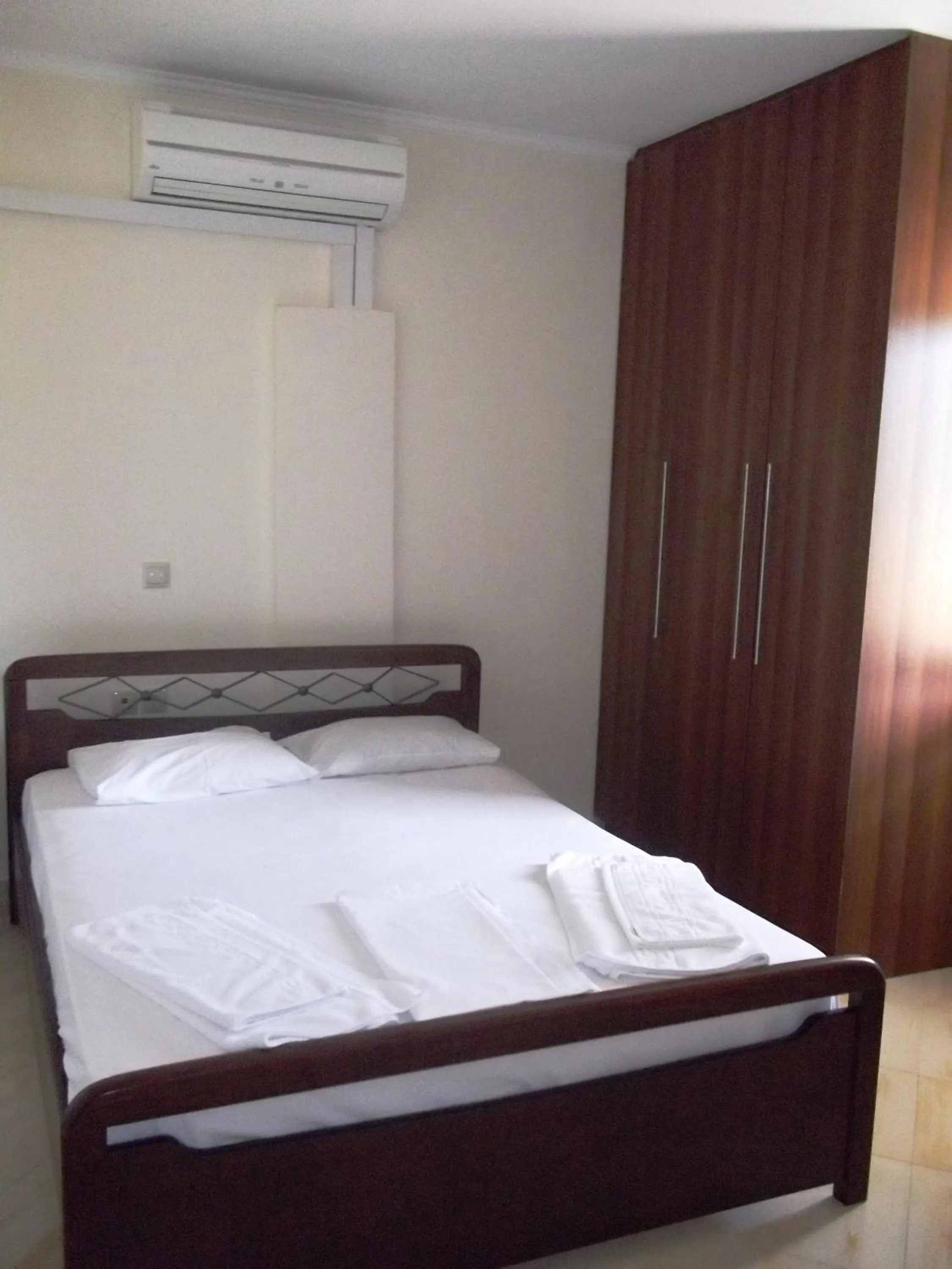 Bed in Calypso Luxury Studios