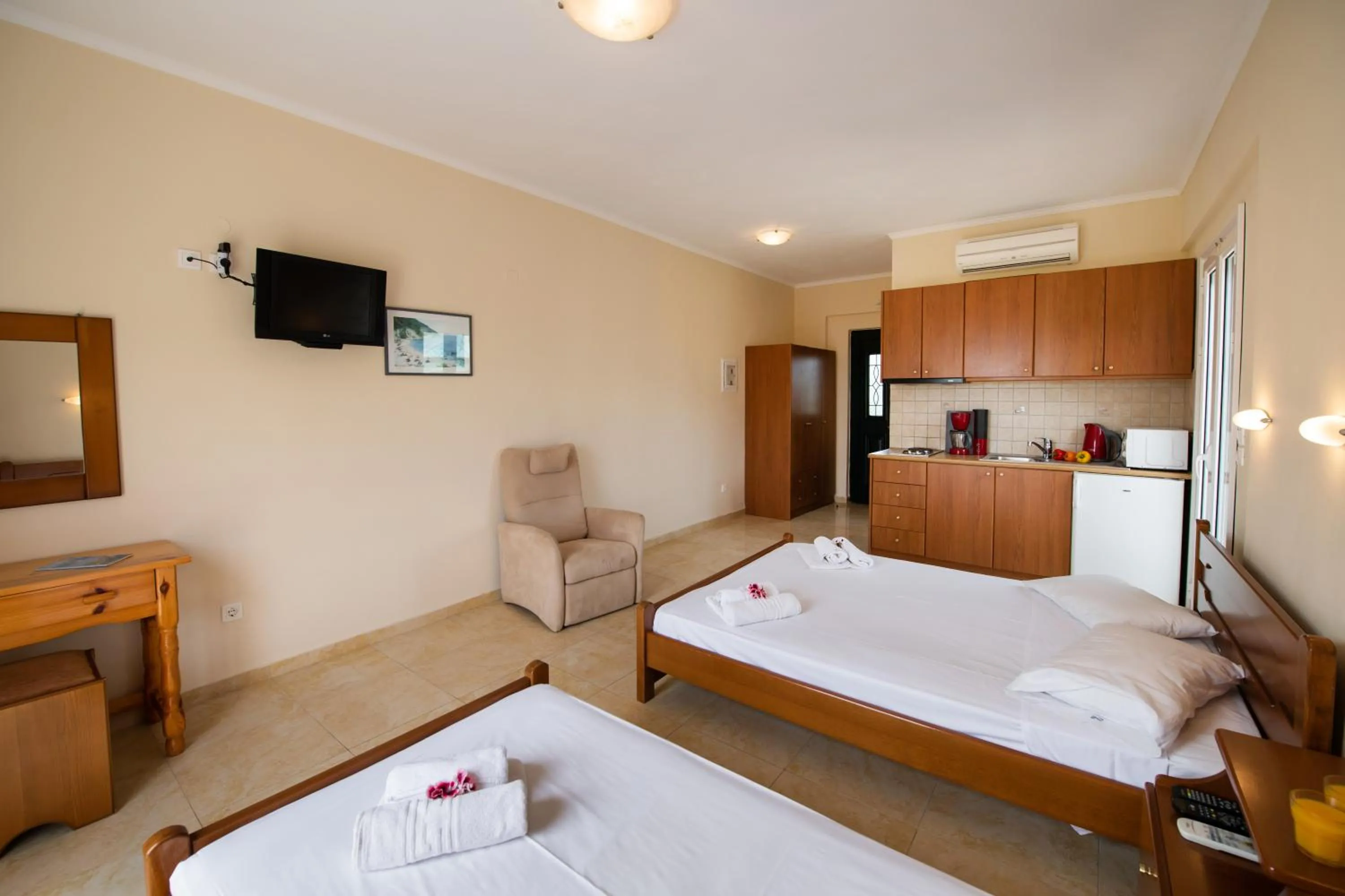 Bed in Calypso Luxury Studios