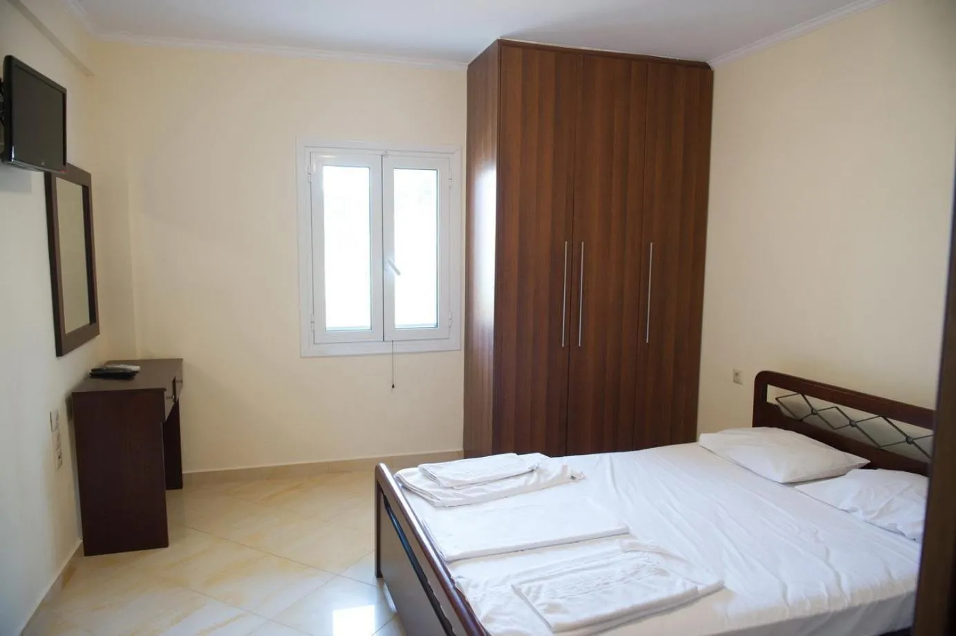 Bed in Calypso Luxury Studios