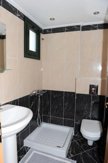 Bathroom in Calypso Luxury Studios