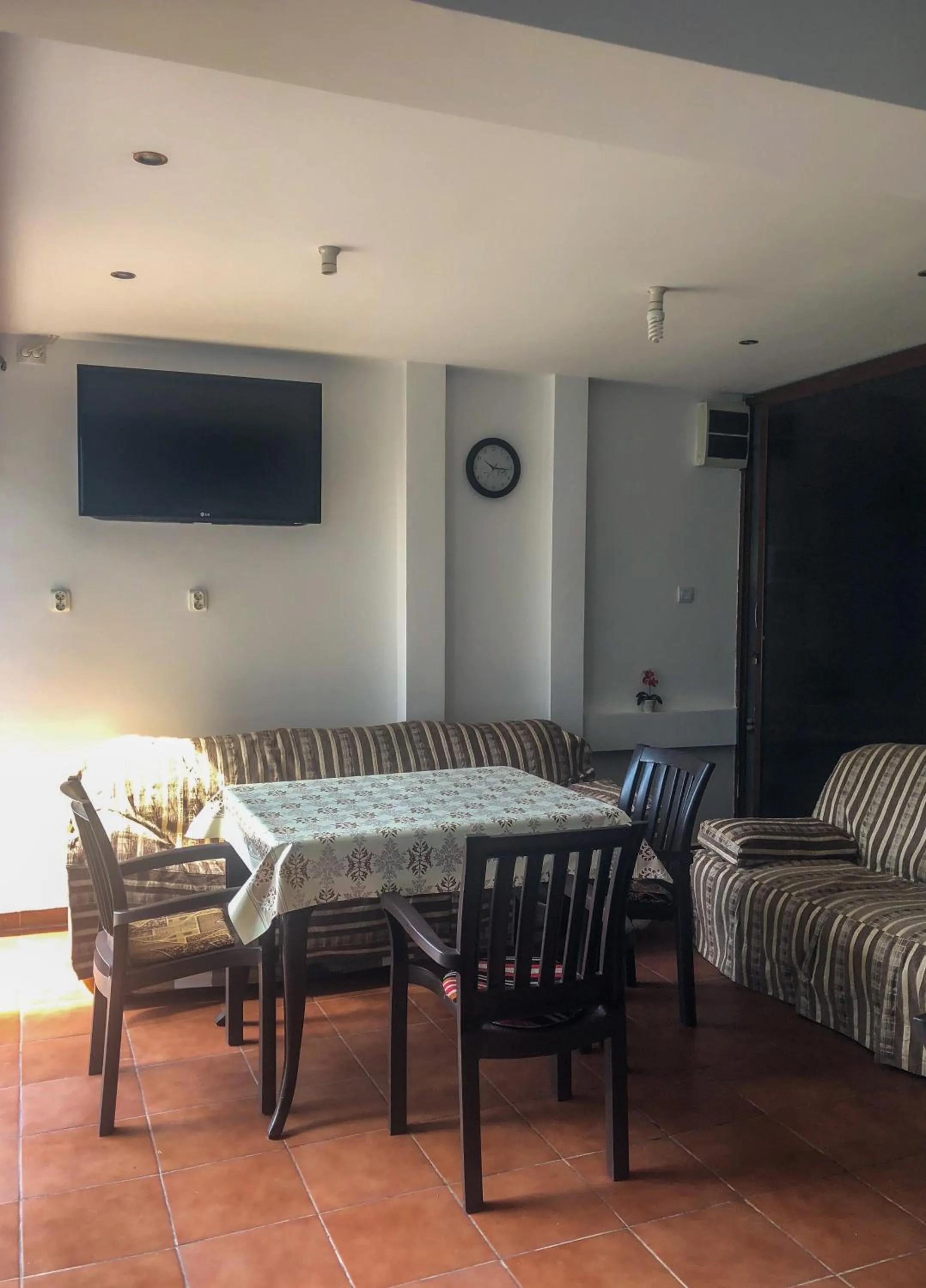 Communal lounge/ TV room in Villa Anastasia