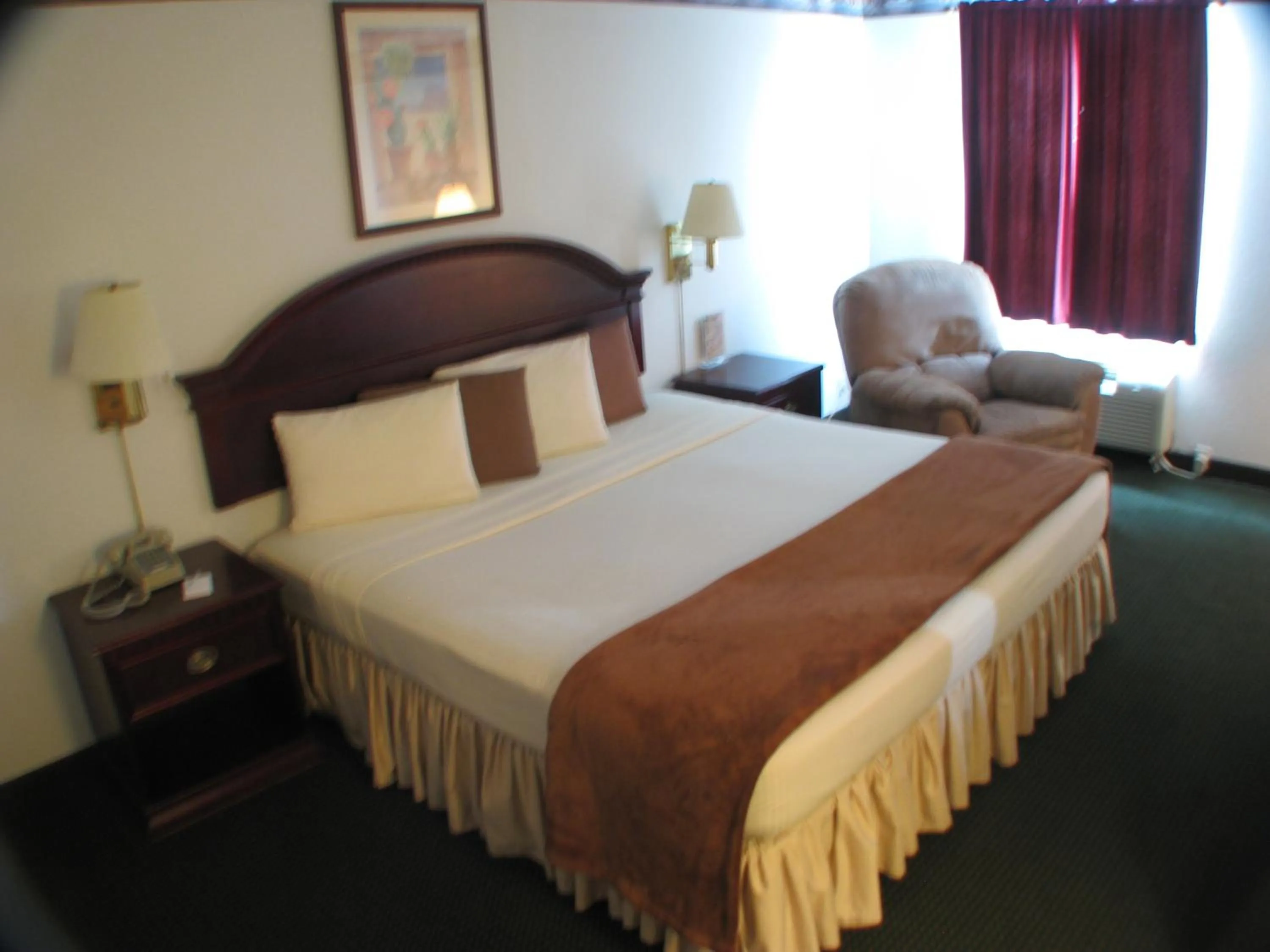 Bed in Dodge House Hotel