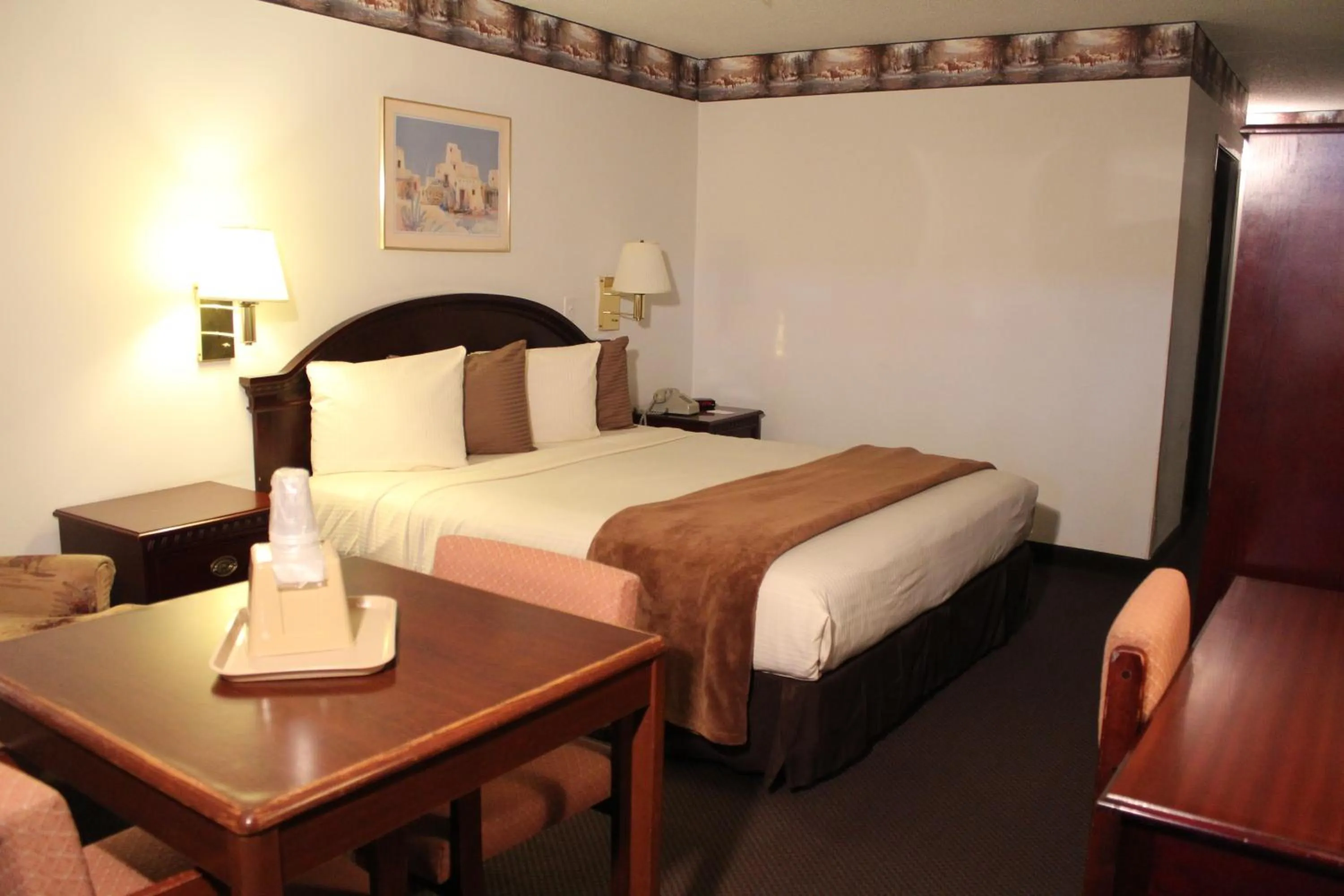 Bed in Dodge House Hotel