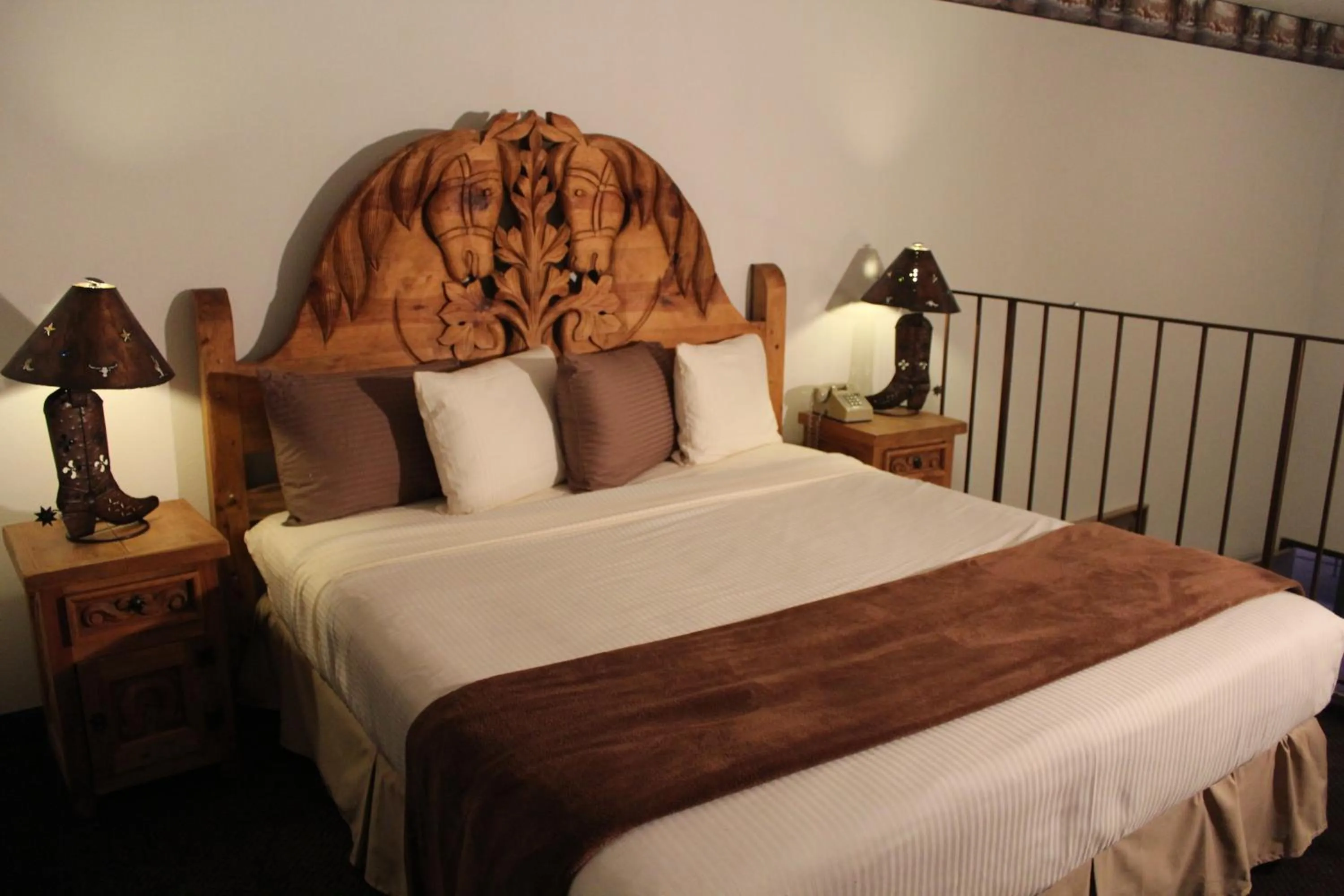 Bed in Dodge House Hotel