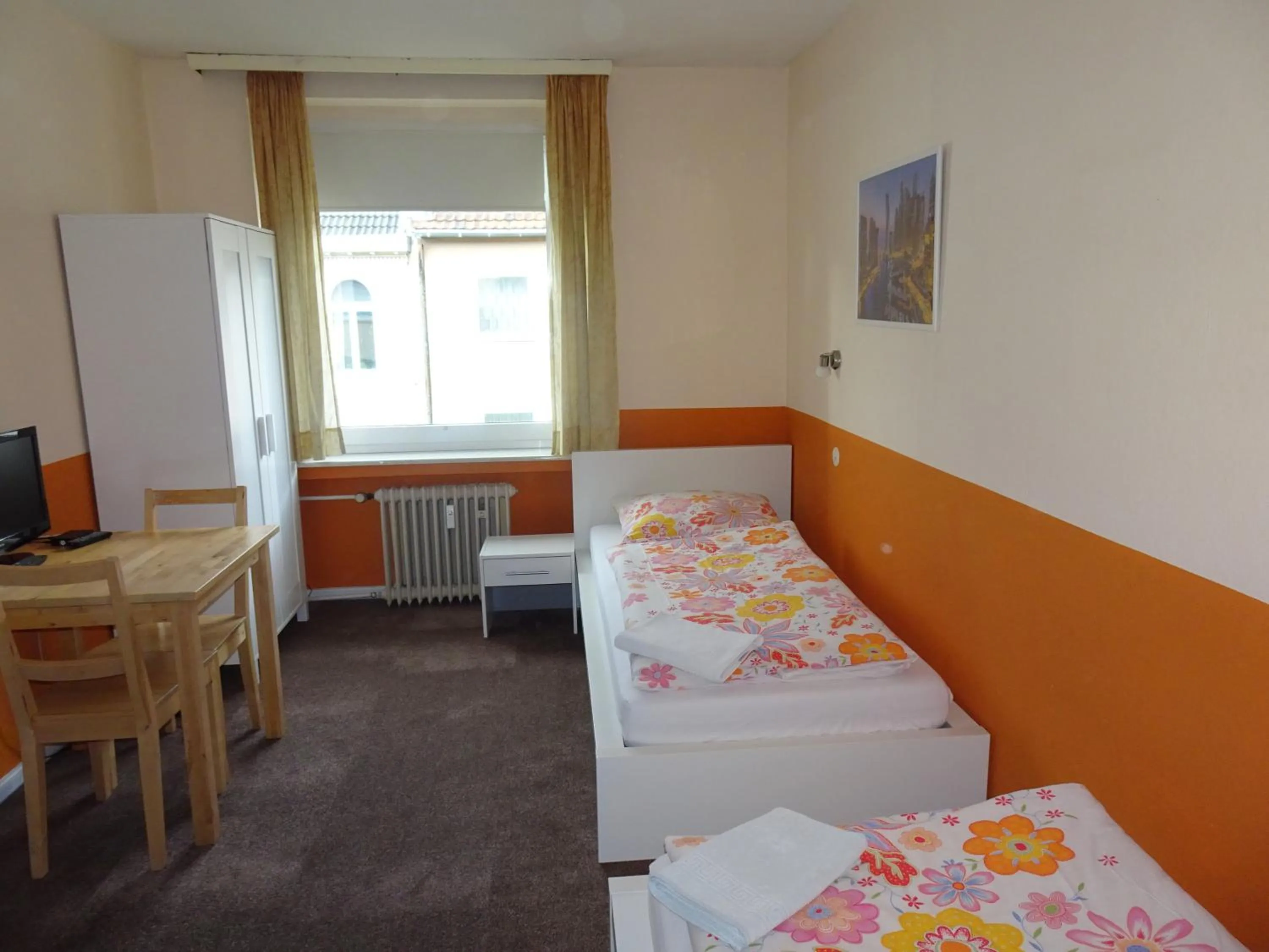 Photo of the whole room, Bed in Gästehaus Grupello