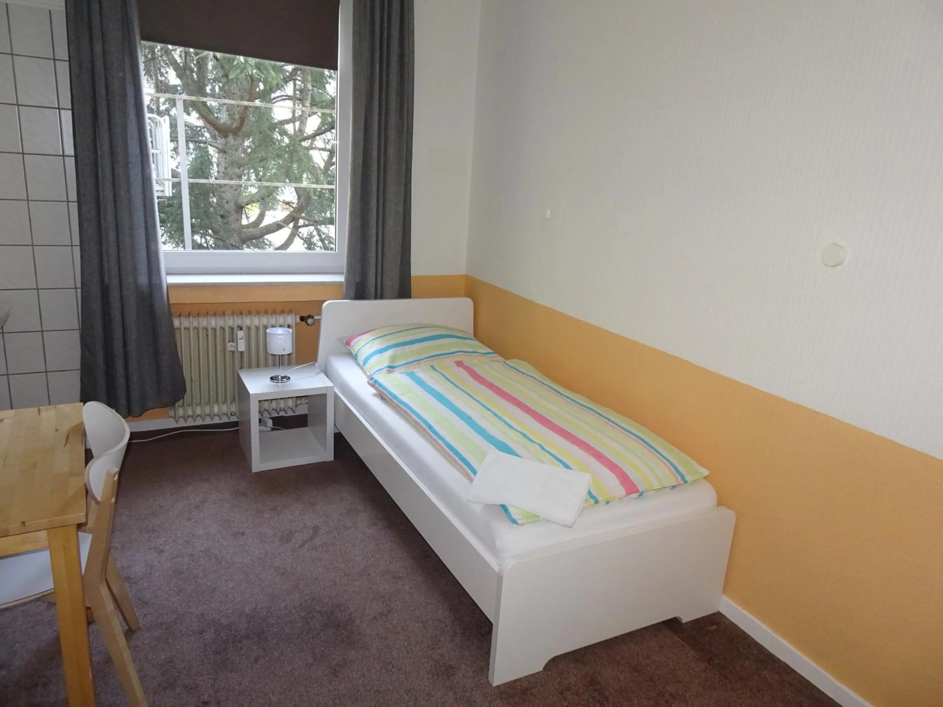Photo of the whole room, Bed in Gästehaus Grupello