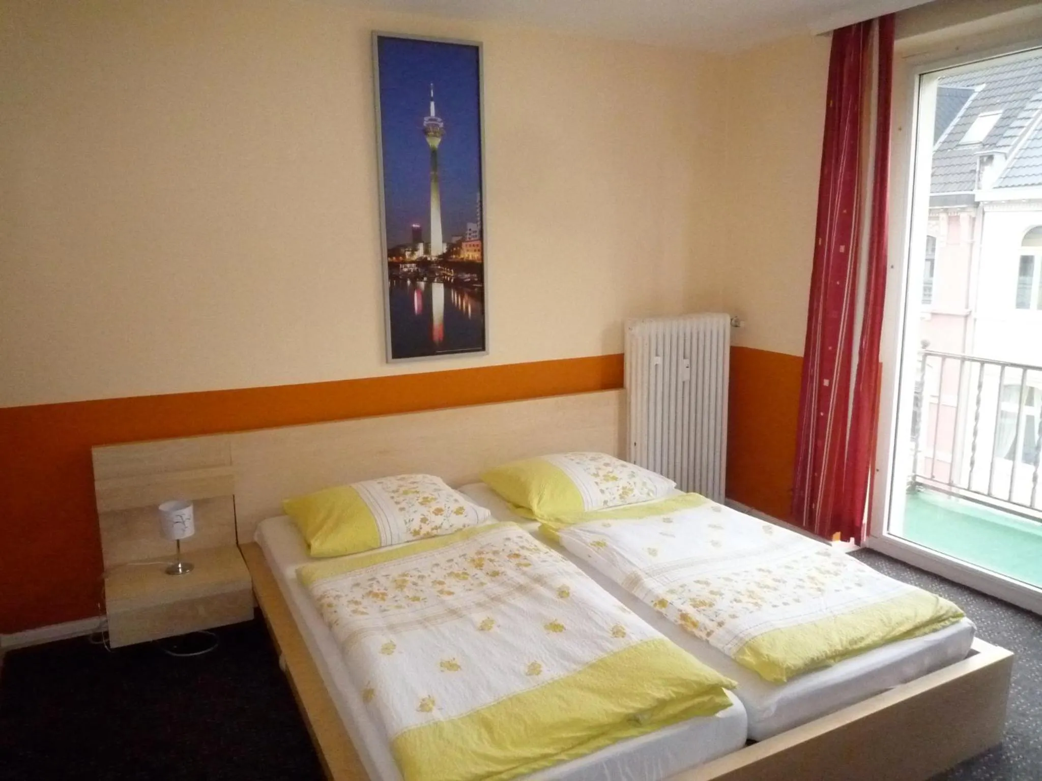 Photo of the whole room, Bed in Gästehaus Grupello