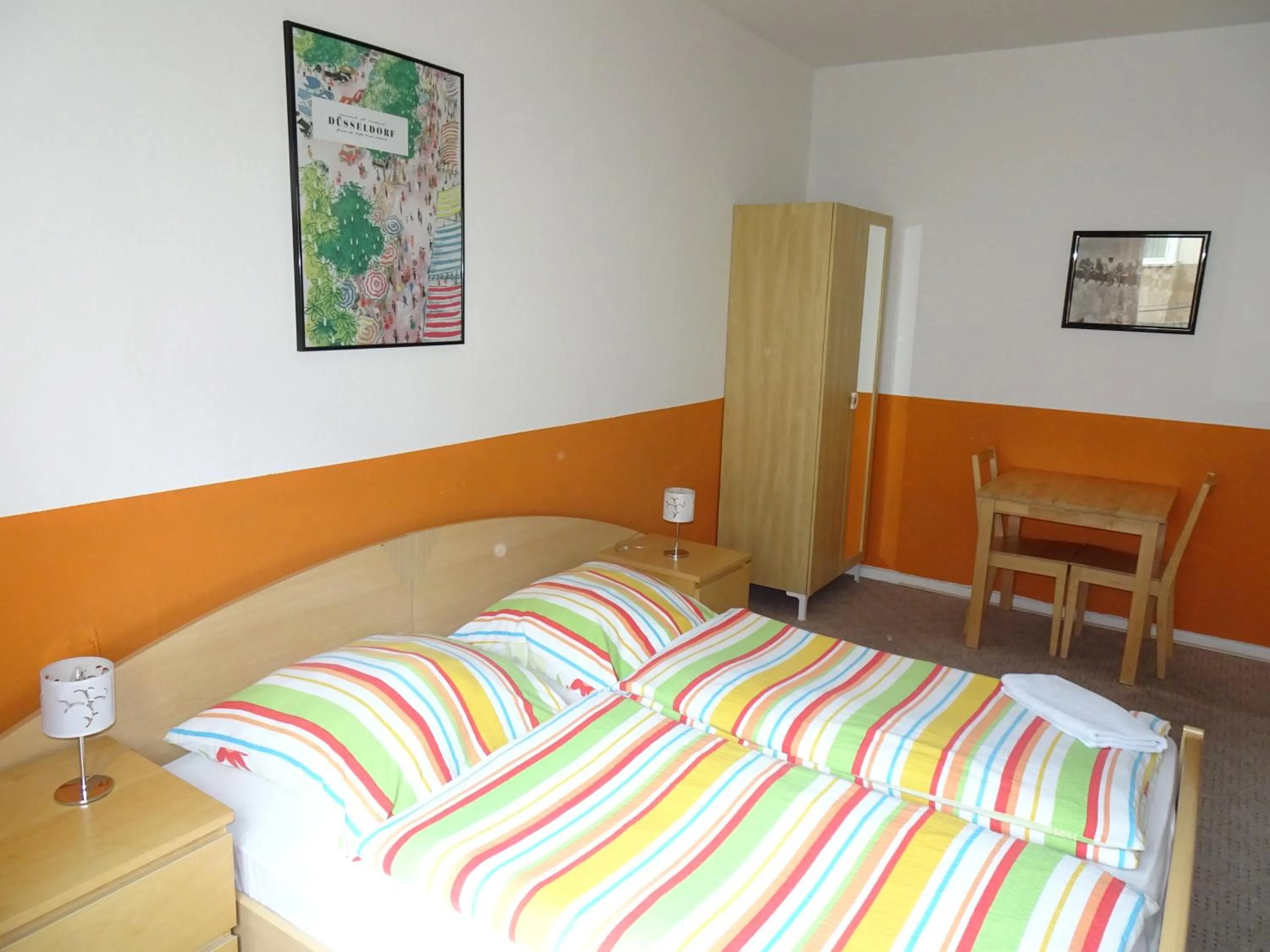 Photo of the whole room, Bed in Gästehaus Grupello