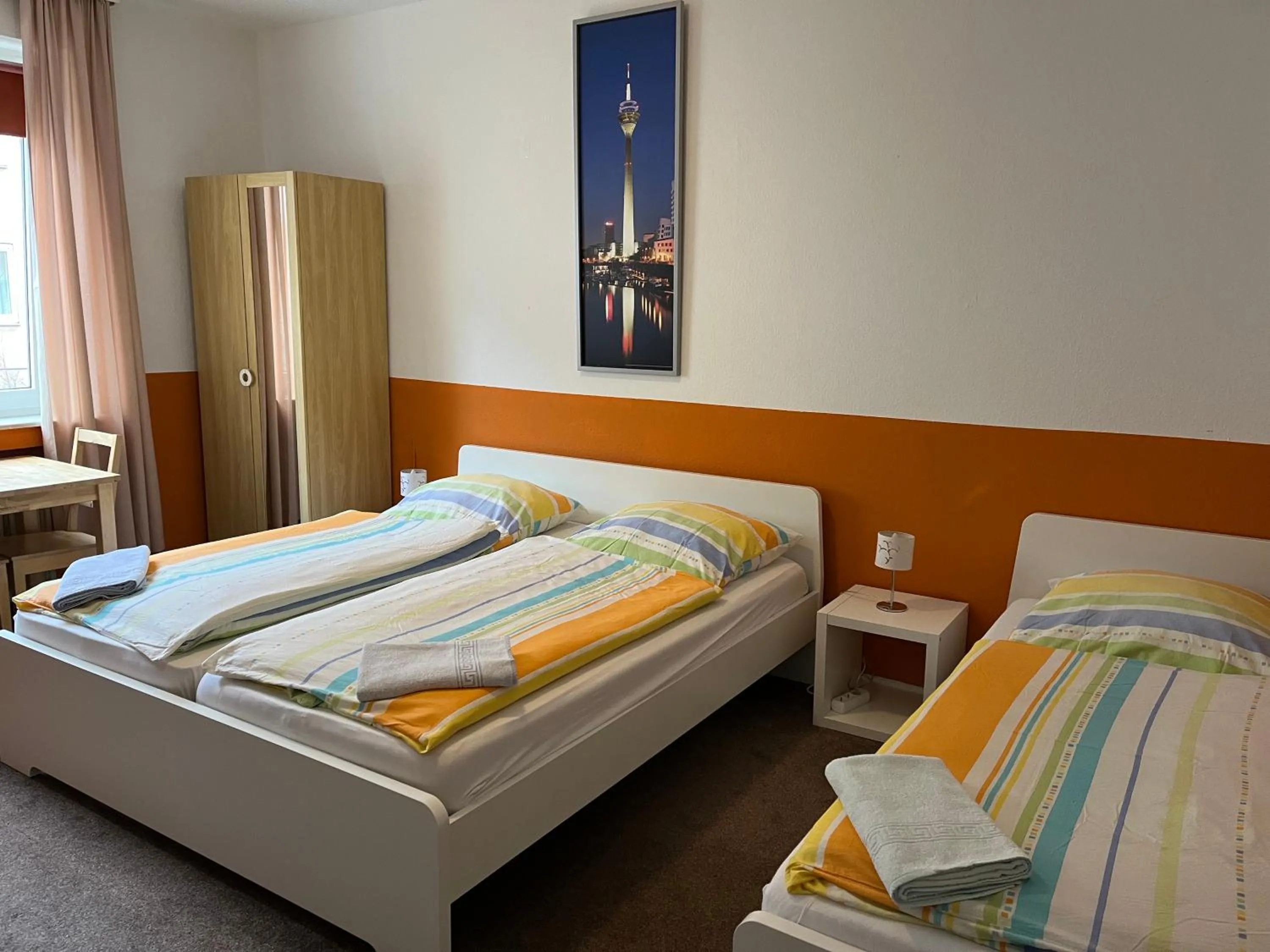 Photo of the whole room, Bed in Gästehaus Grupello