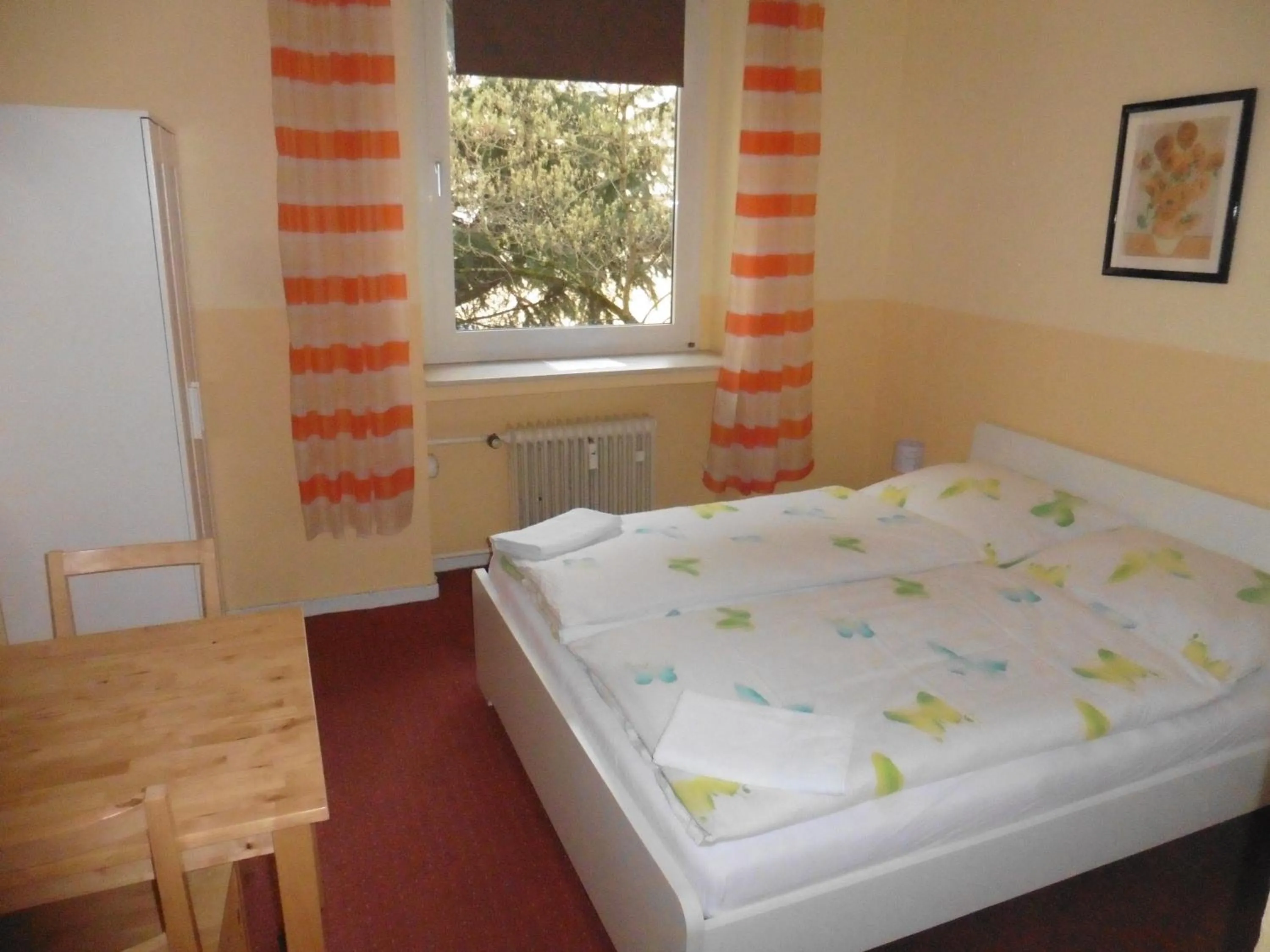 Photo of the whole room, Bed in Gästehaus Grupello