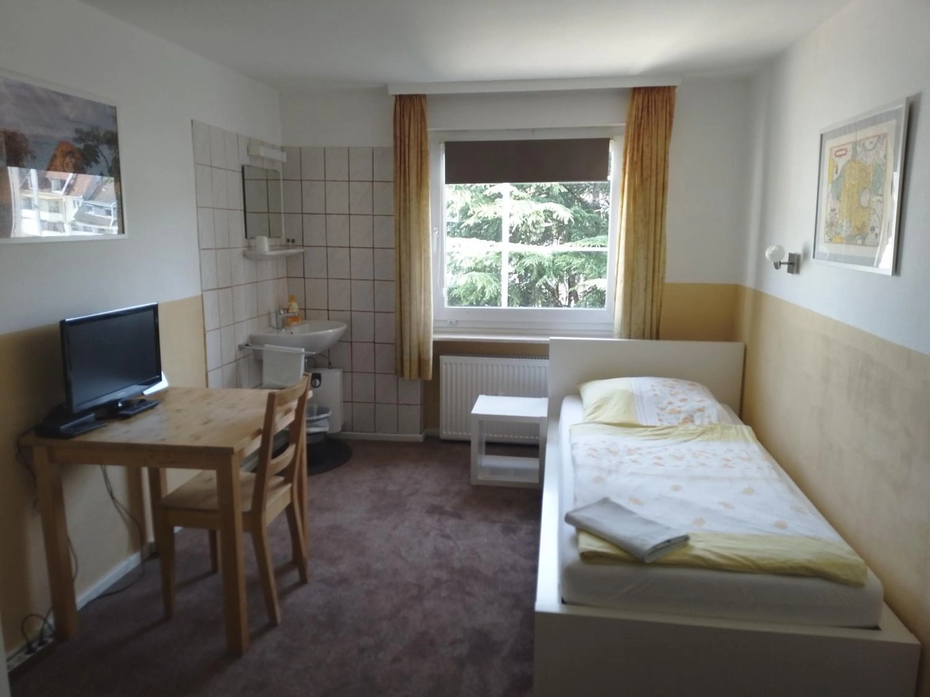 Bed in Gästehaus Grupello