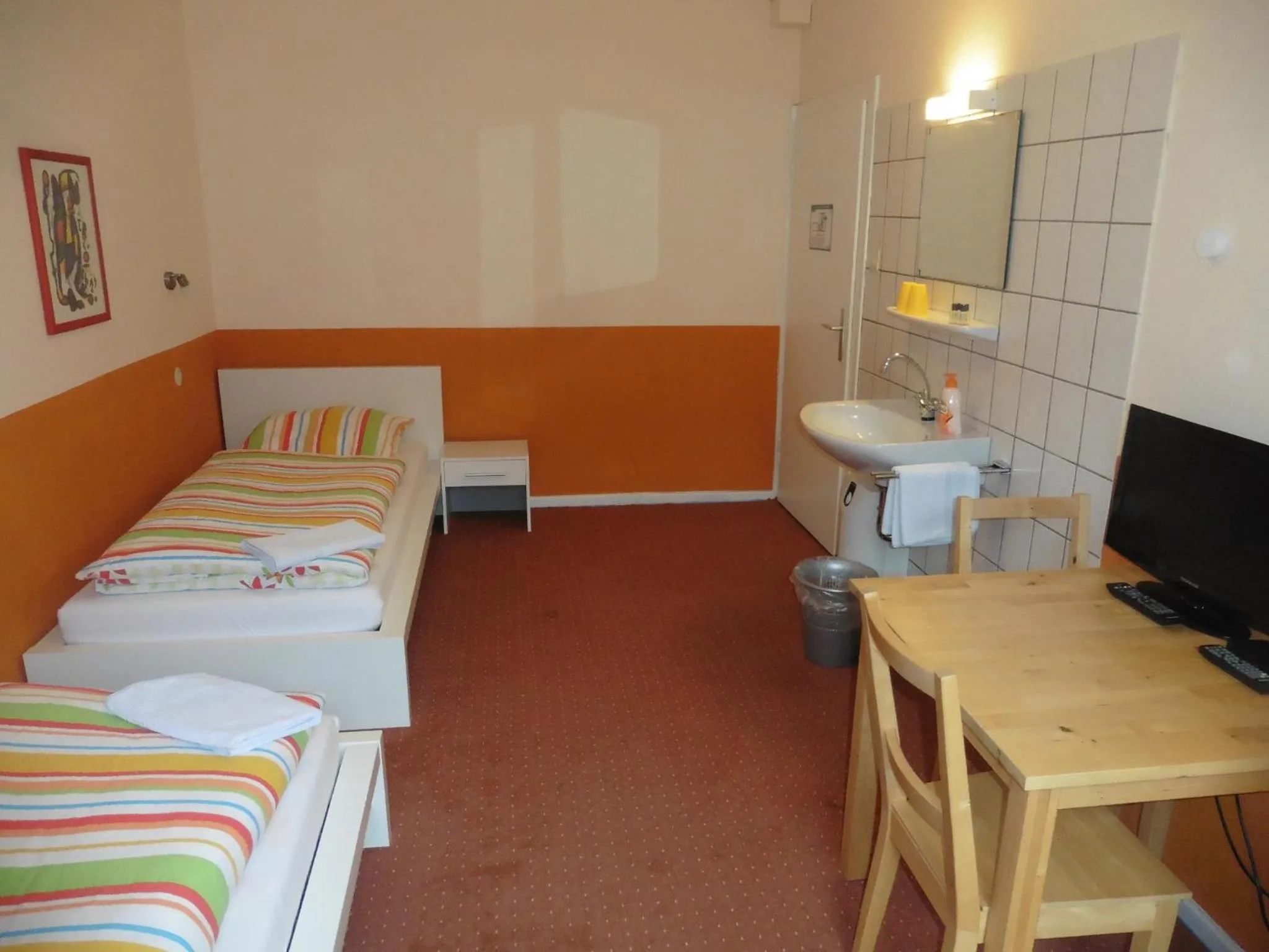 Photo of the whole room, Bed in Gästehaus Grupello