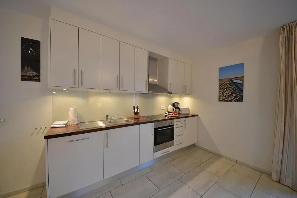 Kitchen or kitchenette in Villa Verdi - Ferienwohnung 2