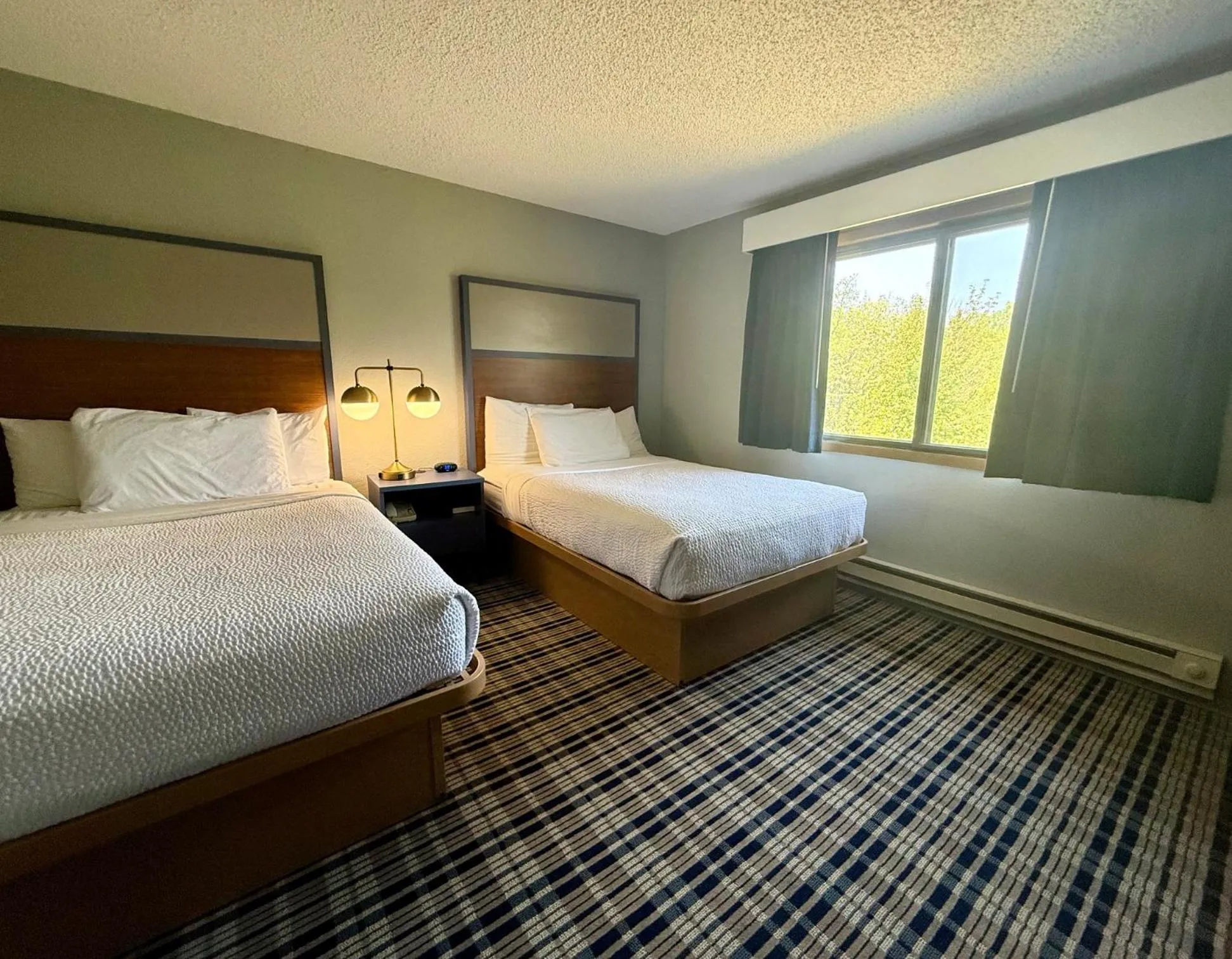 Bed in AmericInn by Wyndham Tofte Near Lake Superior
