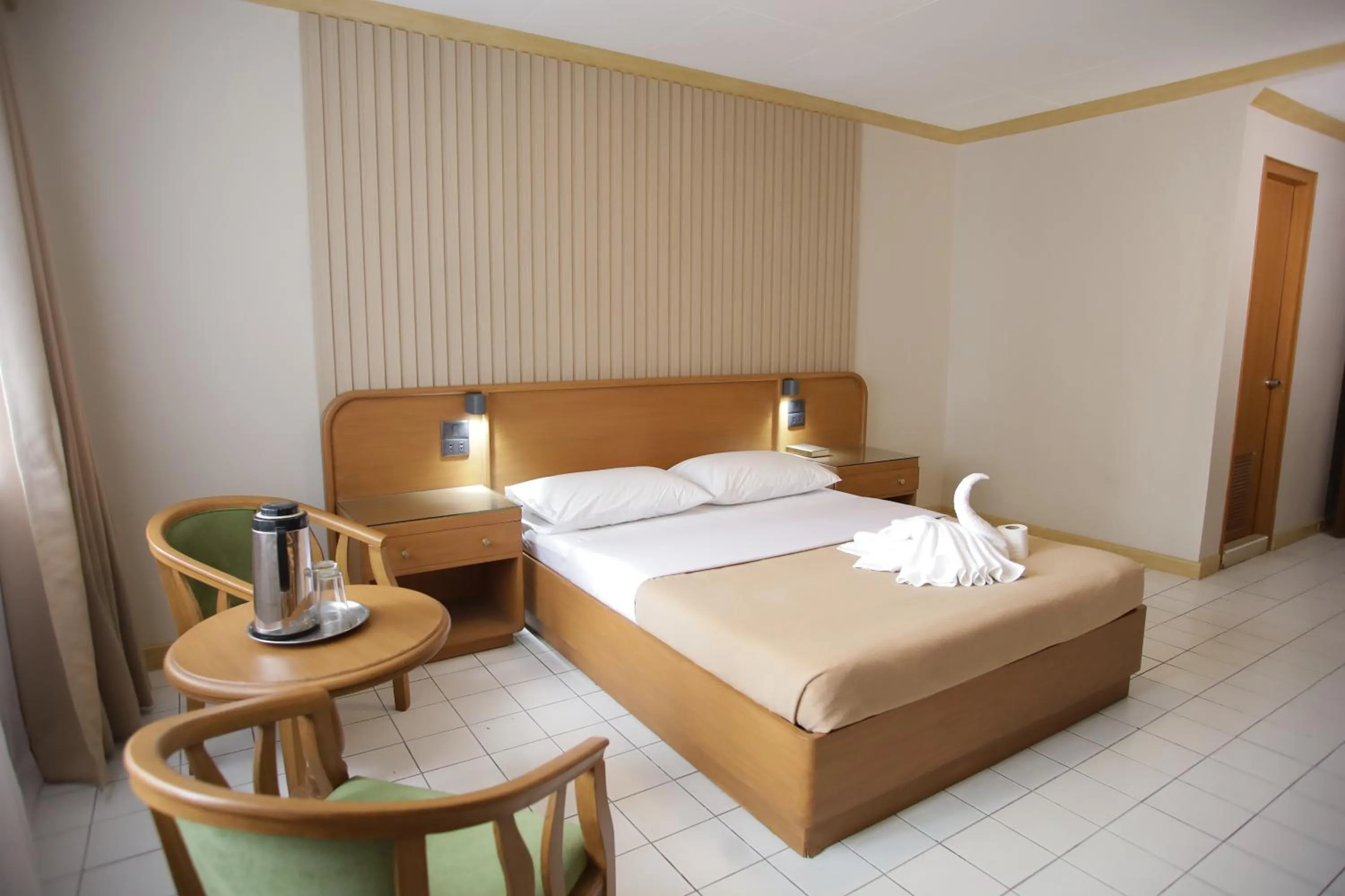 Bed in Hotel Soriente