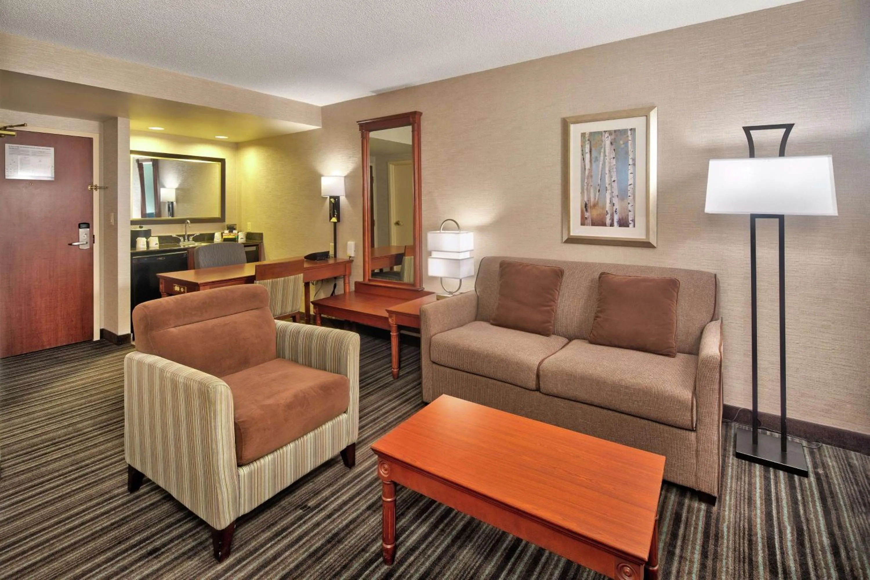 Living room in Hampton Inn & Suites by Hilton Toronto Airport