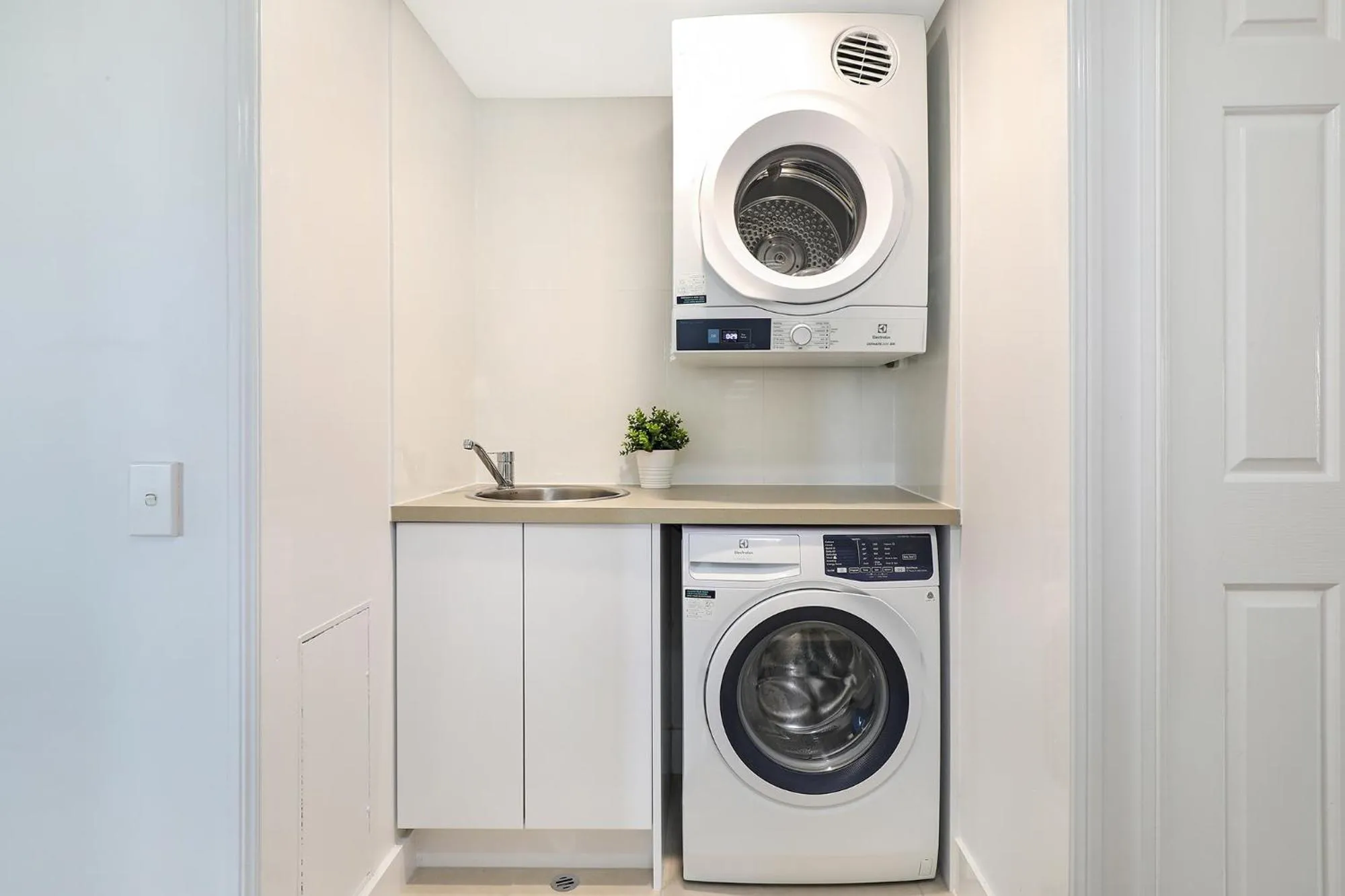 washing machine in Dockside Apartments Mooloolaba