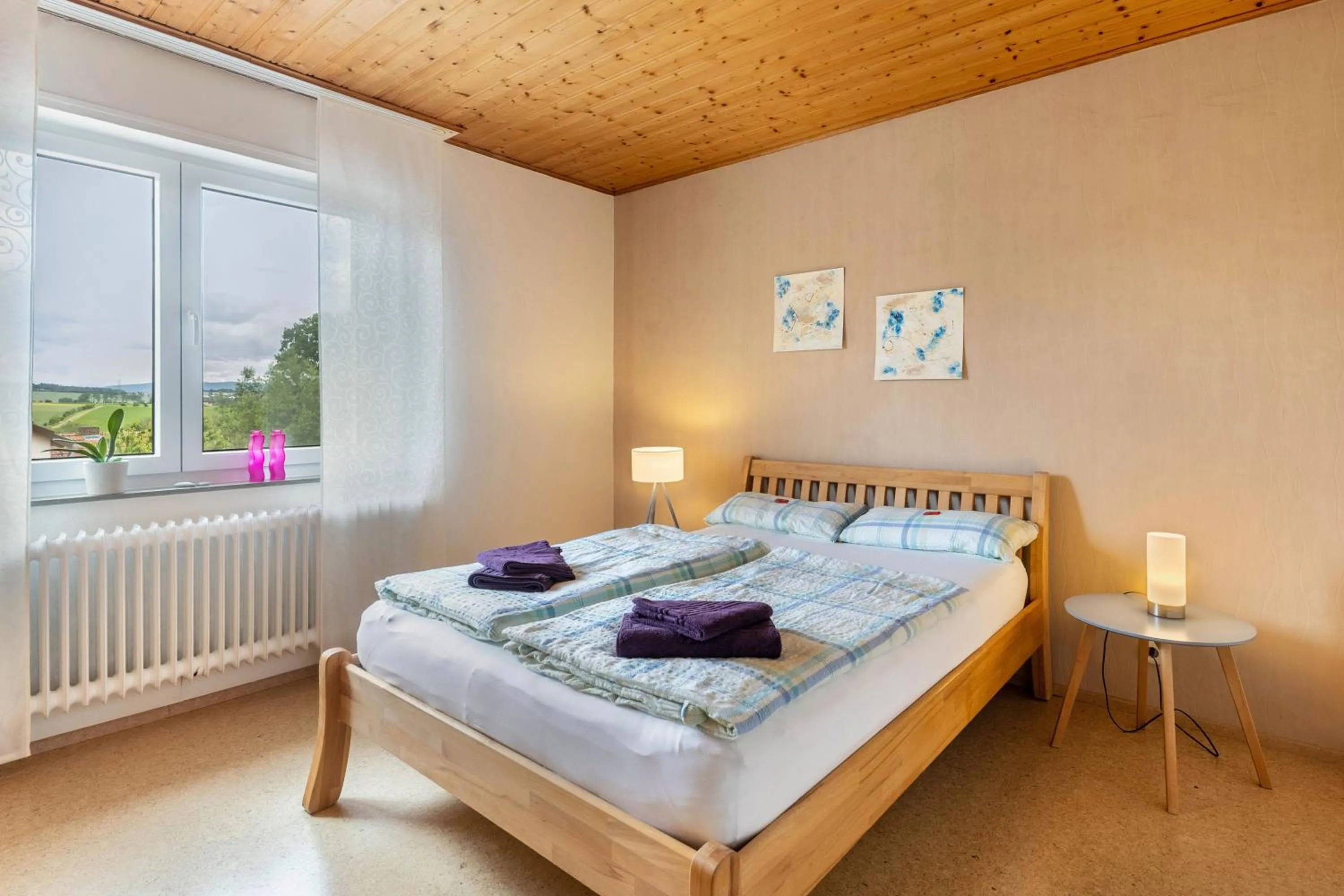 Property building, Bed in Ferienwohnung Landblick