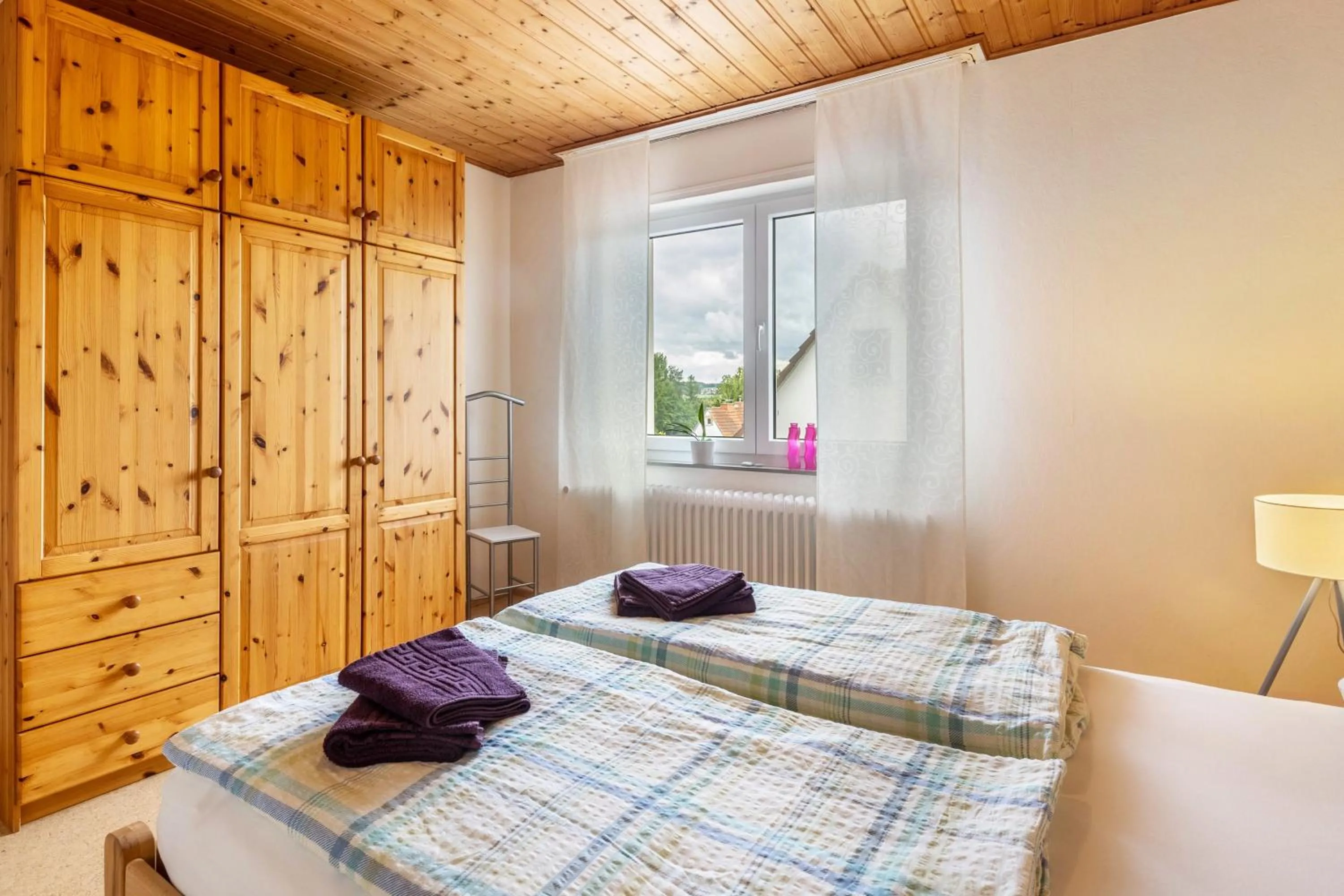 Property building, Bed in Ferienwohnung Landblick