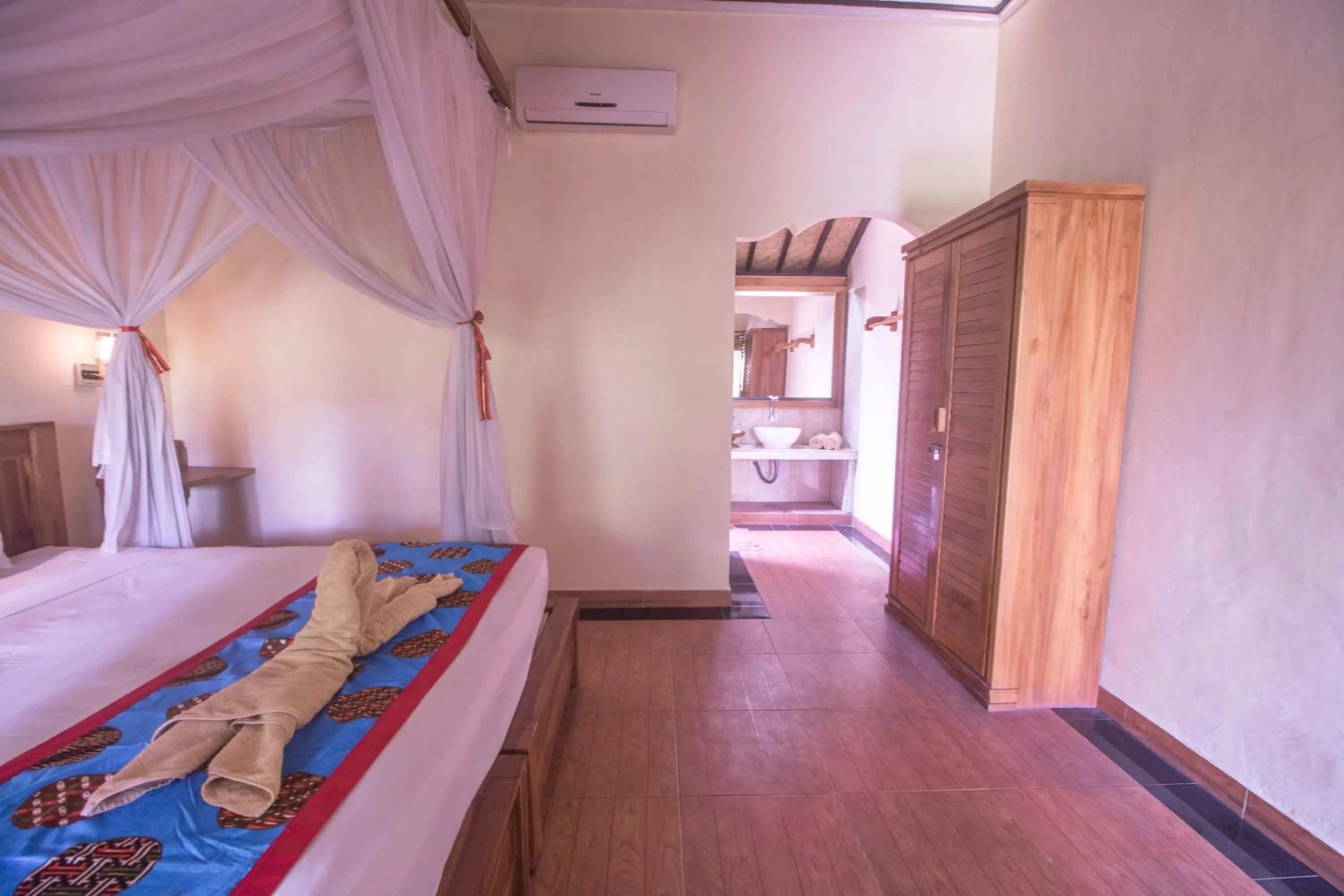 Bed in Trijaya Guest House Pemuteran