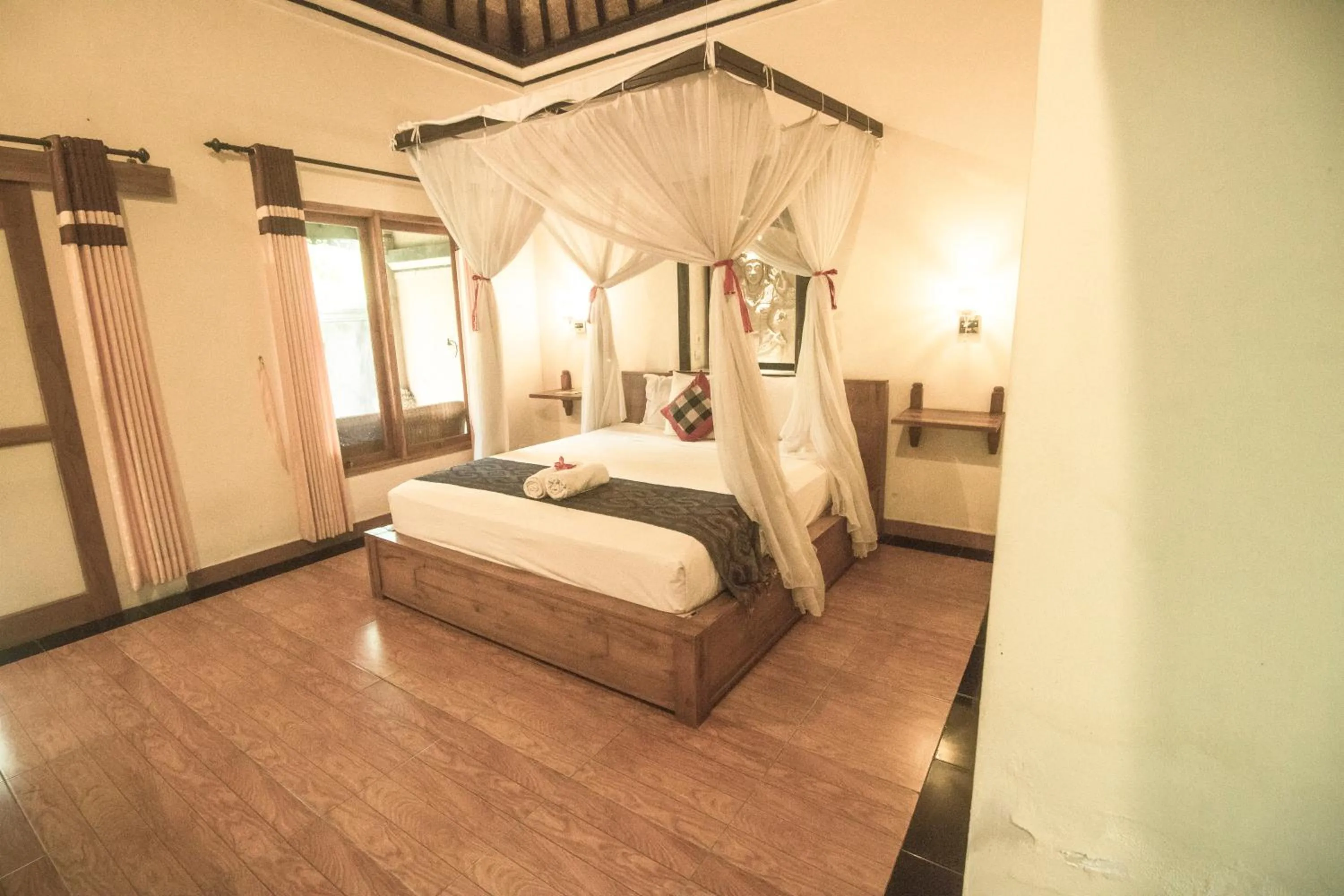 Bed in Trijaya Guest House Pemuteran