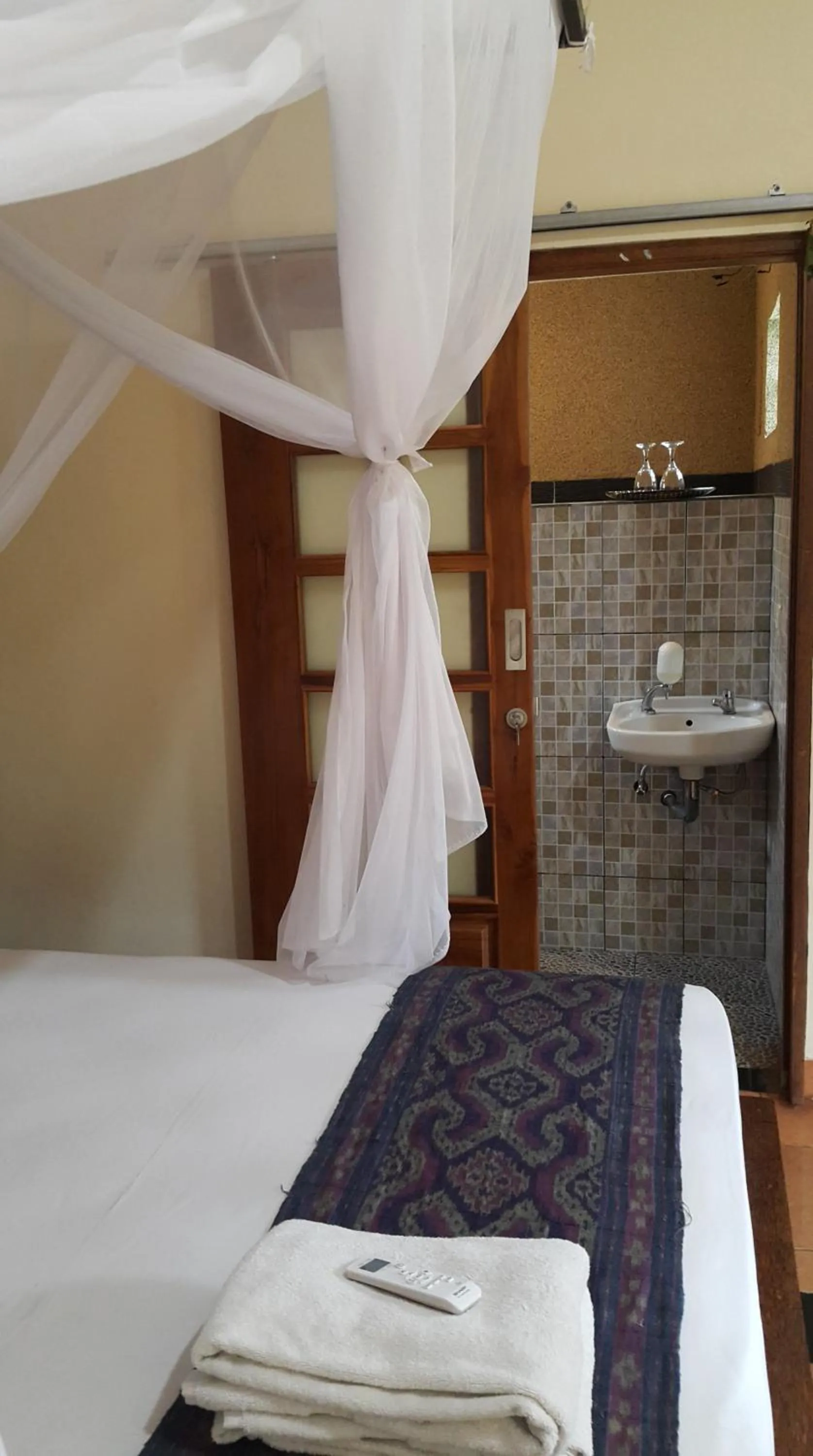 Bedroom, Bed in Trijaya Guest House Pemuteran