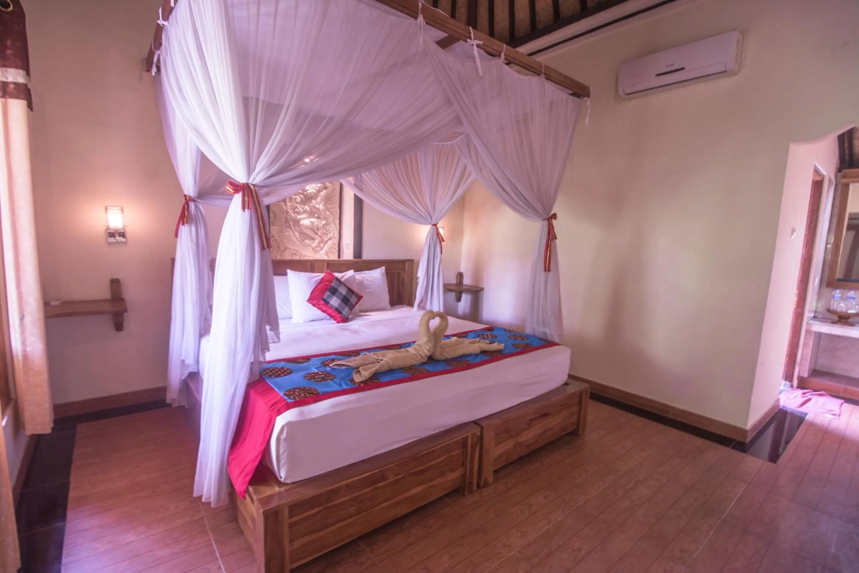 Bed in Trijaya Guest House Pemuteran
